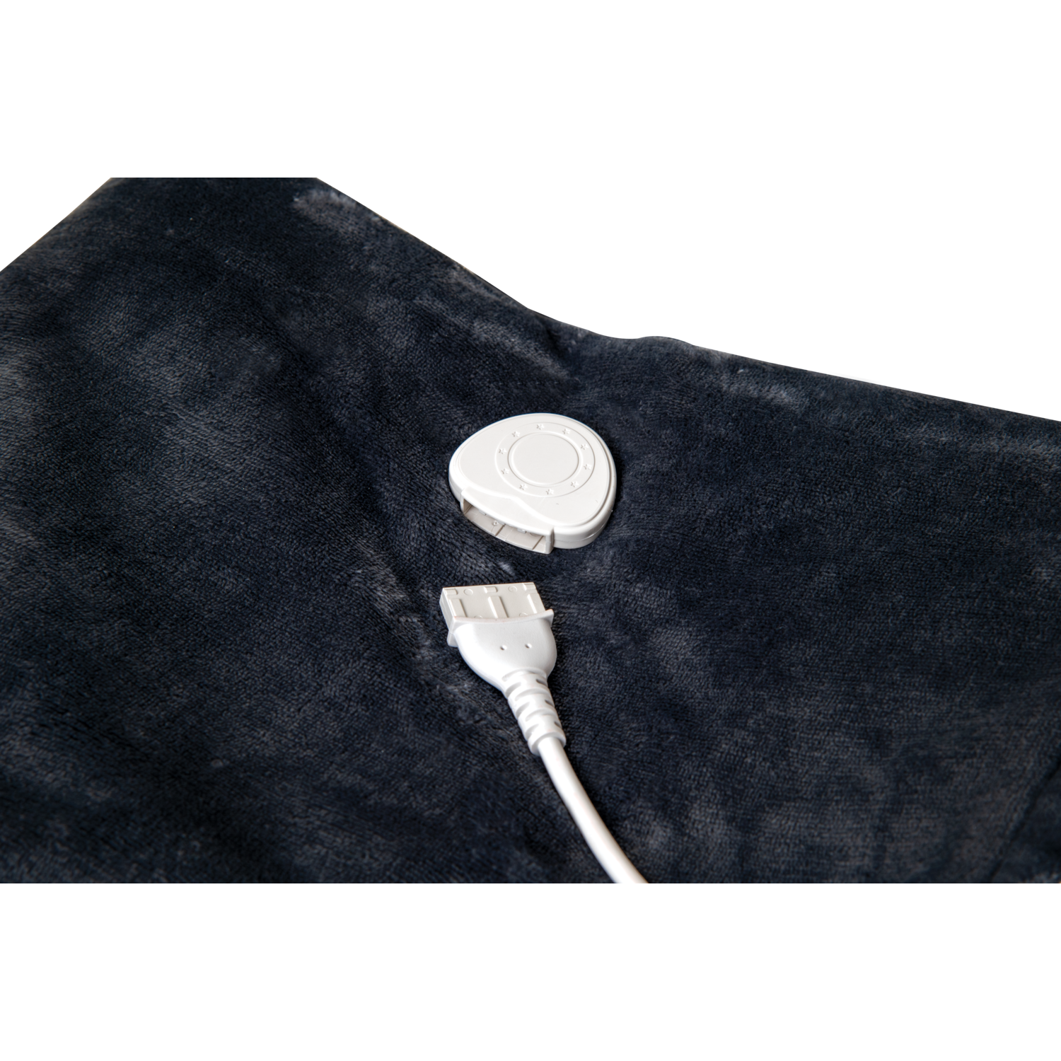 Close-up of a black blanket with a white control module and plug.
