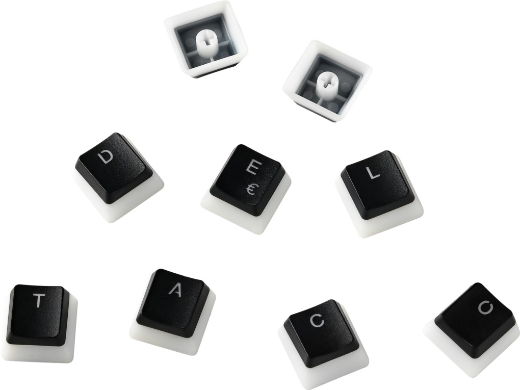Tastaturtasten, schwarz mit weißen Rändern, vor weißem Hintergrund, einige entfernt.