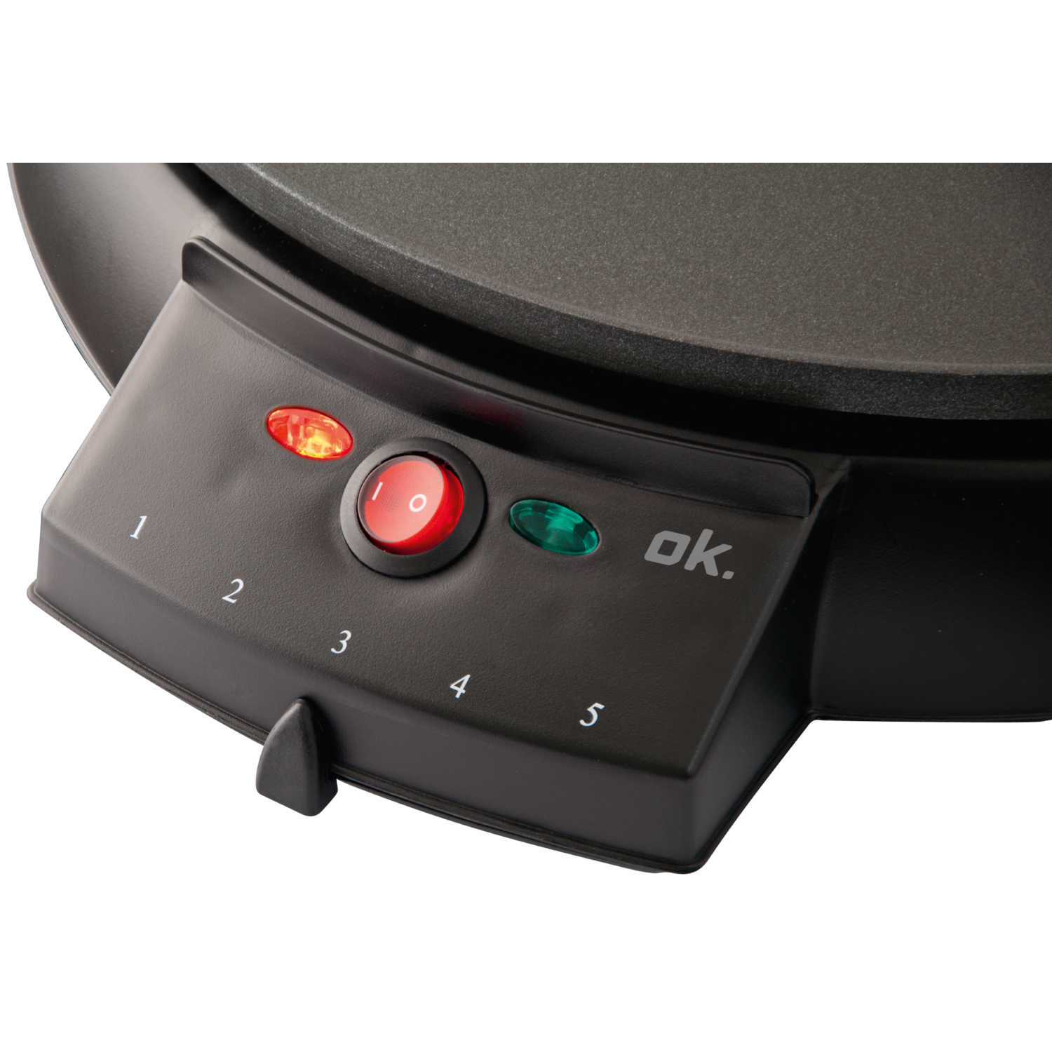 Close-up of a black pancake maker control panel with buttons and lights.