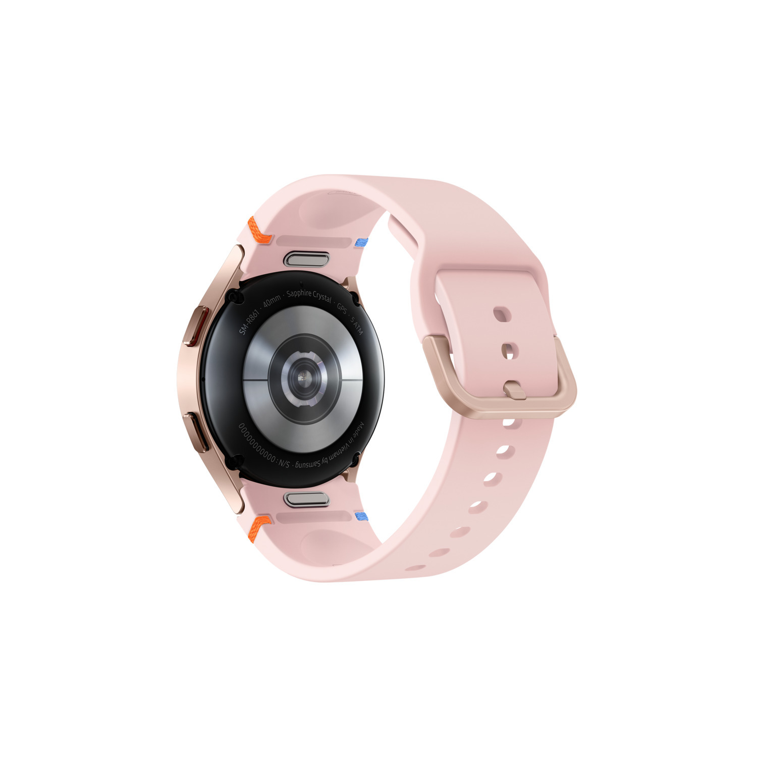 Pink smartwatch on its back, showing the sensors and watch band details. Gold frame.