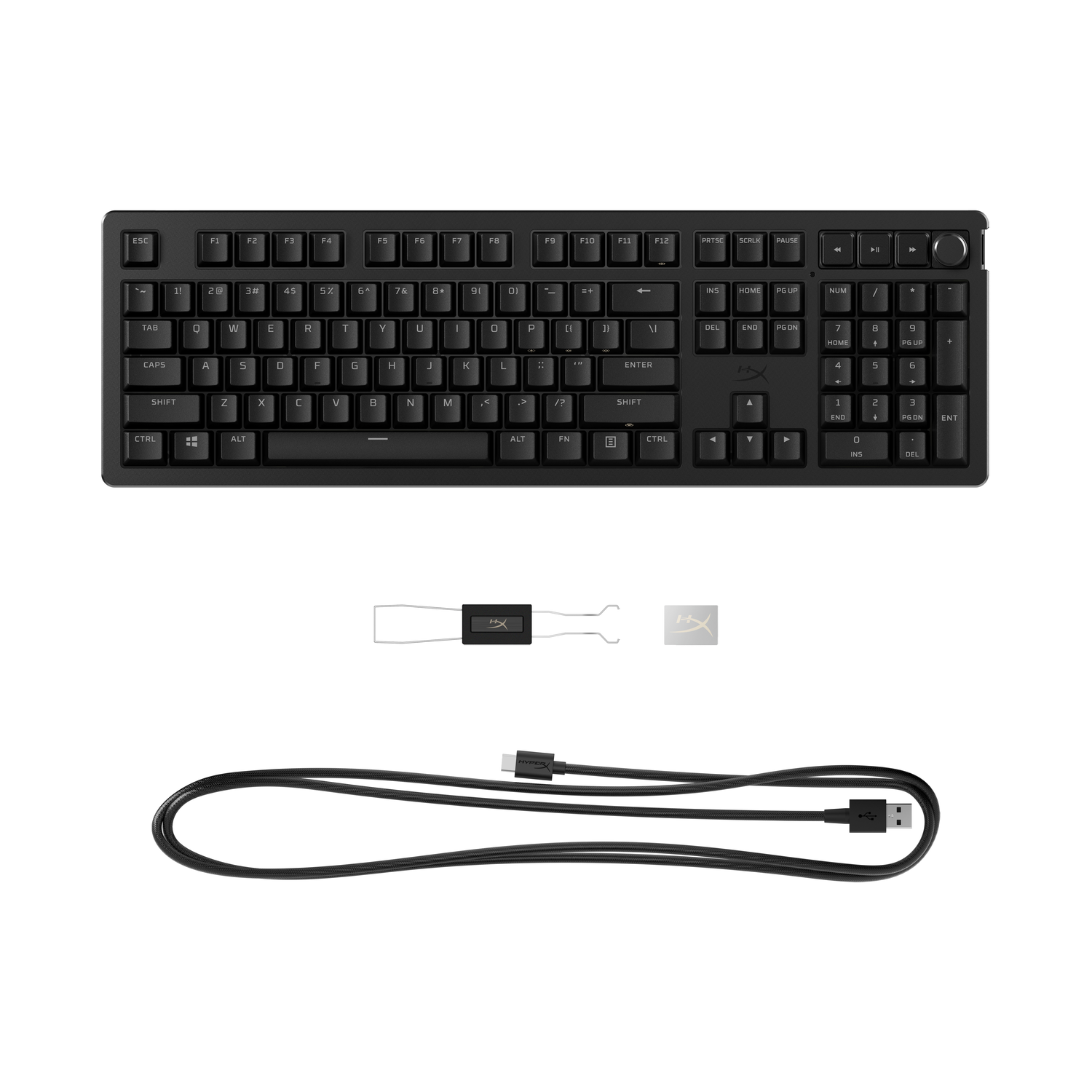 Black HyperX keyboard, accessories, and cable on white background, top view.