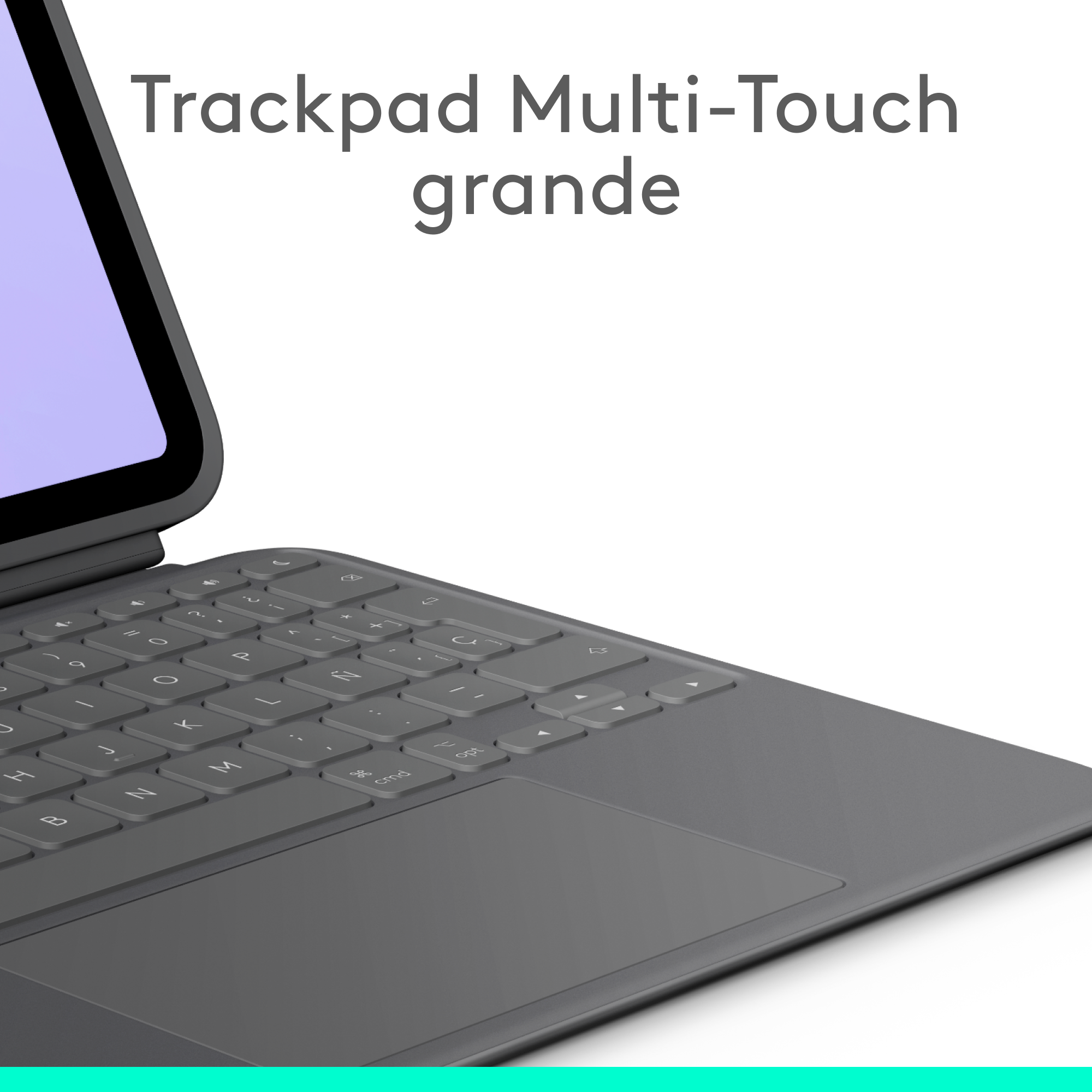 Teclado y panel táctil en un portátil gris. Fondo blanco.