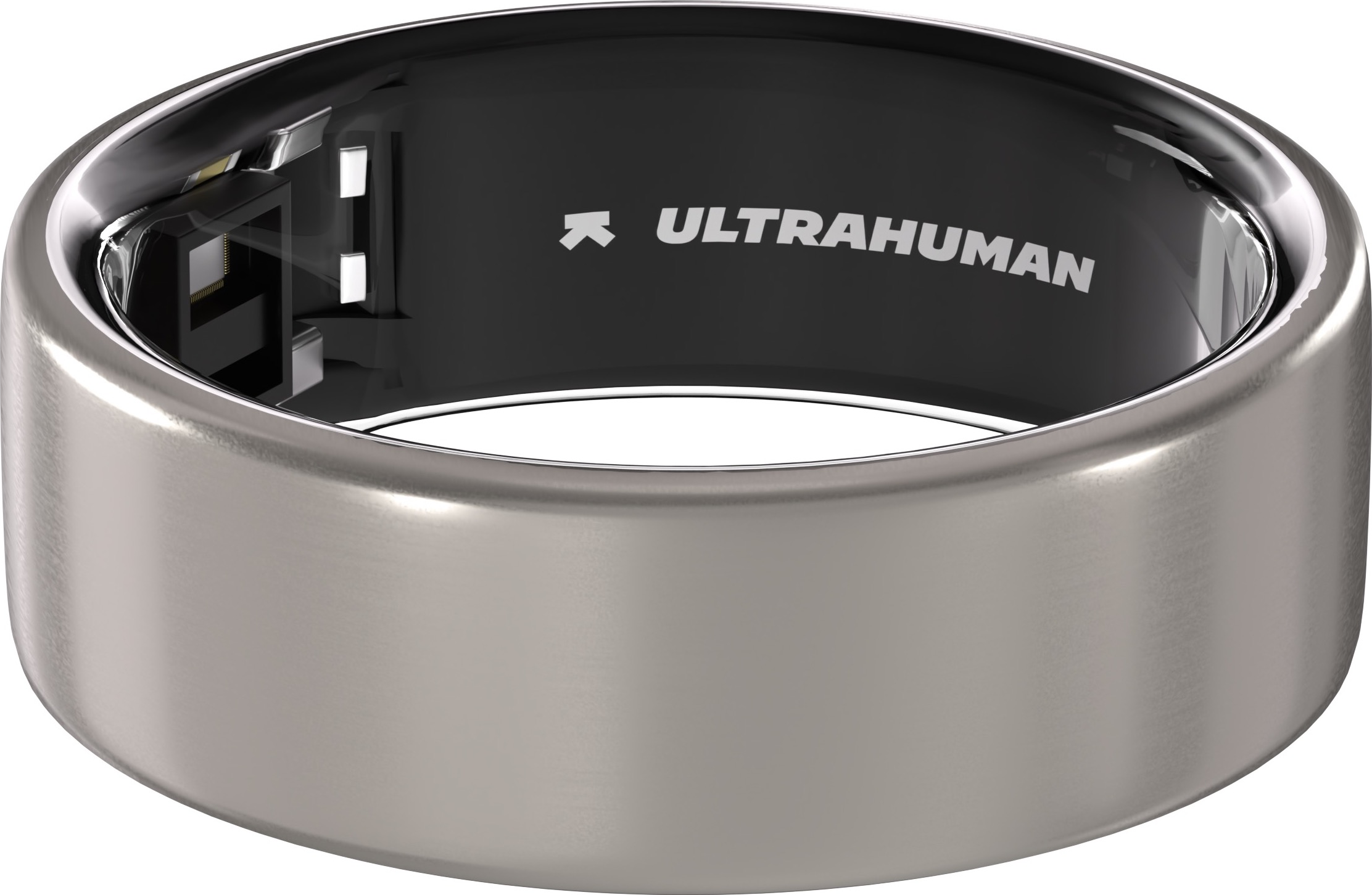 Primo piano di un anello d'argento con la scritta 'ULTRAHUMAN' all'interno.