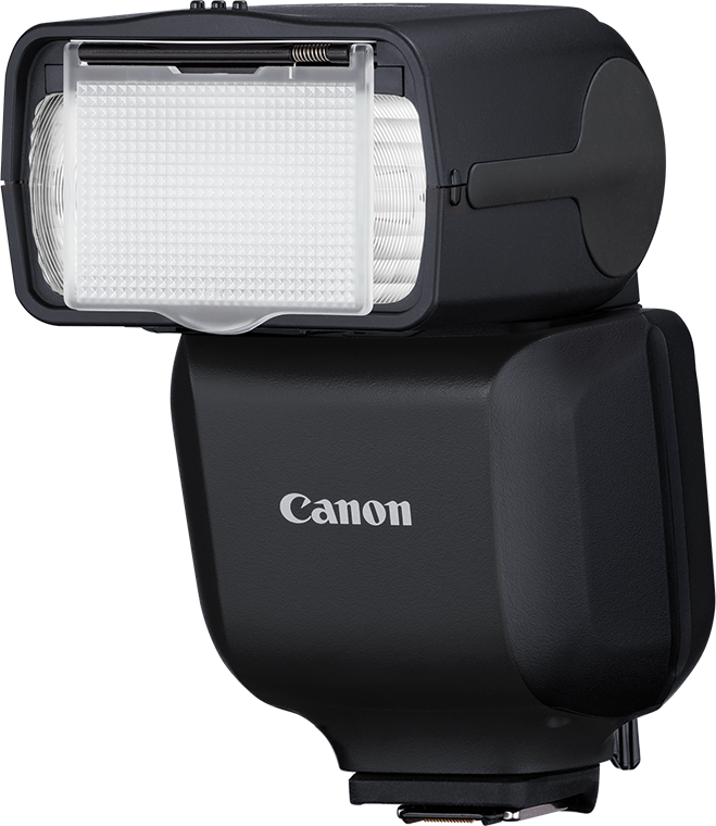 Un flash Canon noir avec le logo Canon. Il est sur un fond blanc.