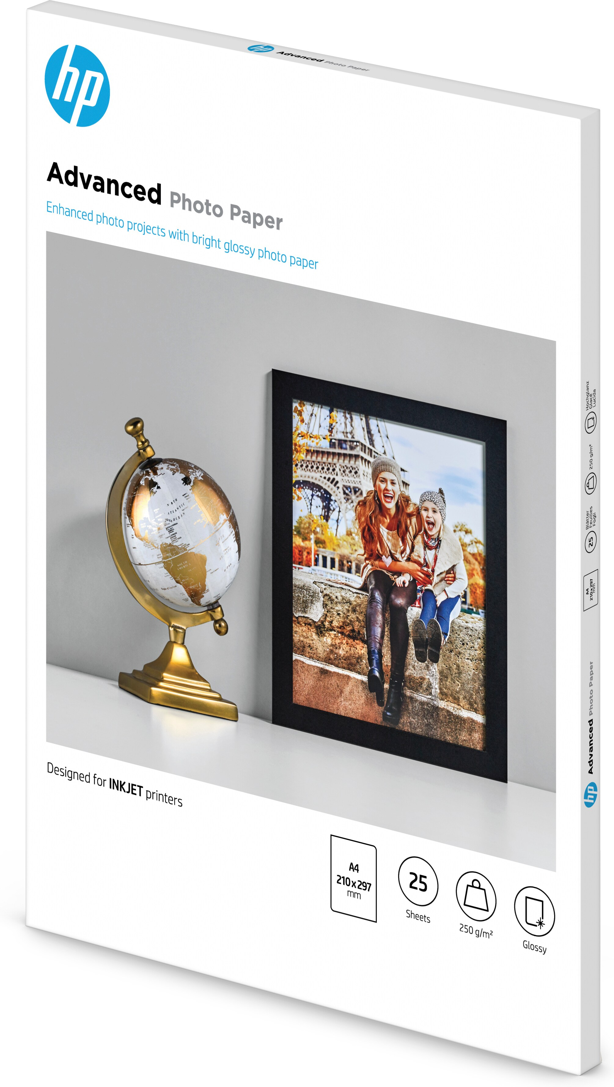 A4-Papierpackung mit Fotorahmen, Globus und Bild eines Paares am Eiffelturm.