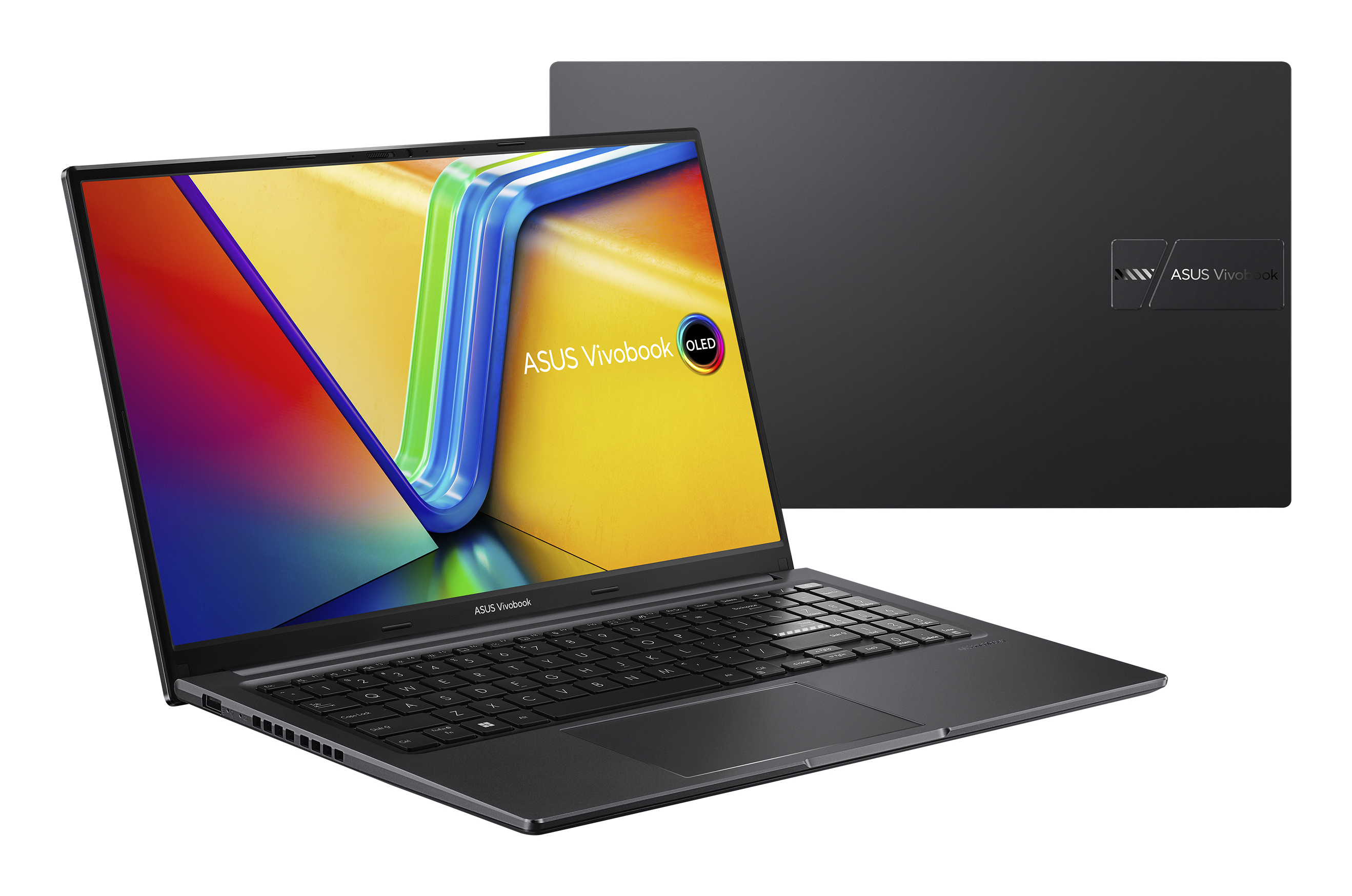 Ordinateur portable ASUS Vivobook noir ouvert sur une surface blanche. Écran affiche un graphique coloré.