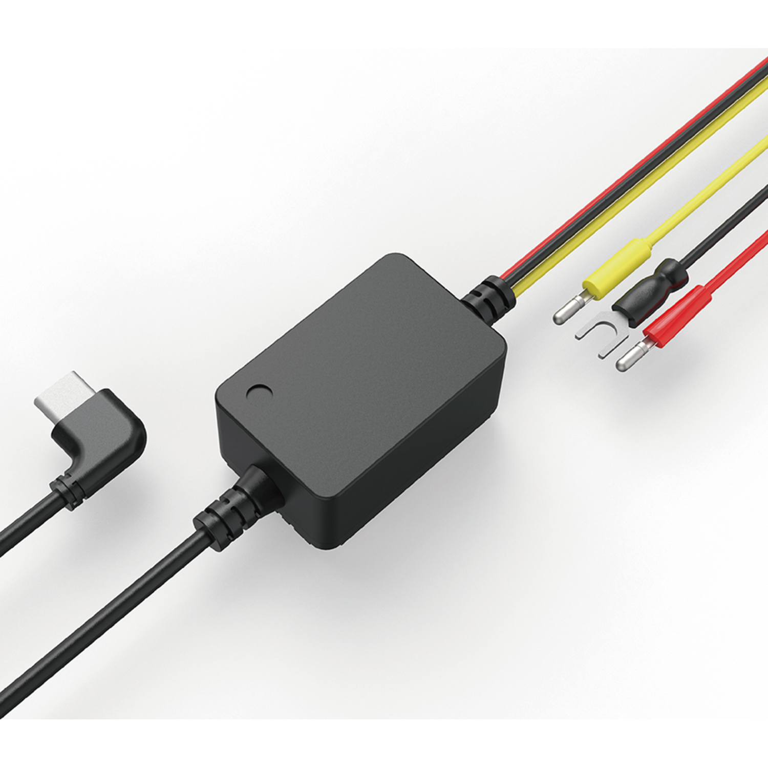 A black box with cables and connectors for power and data transfer on a white surface.