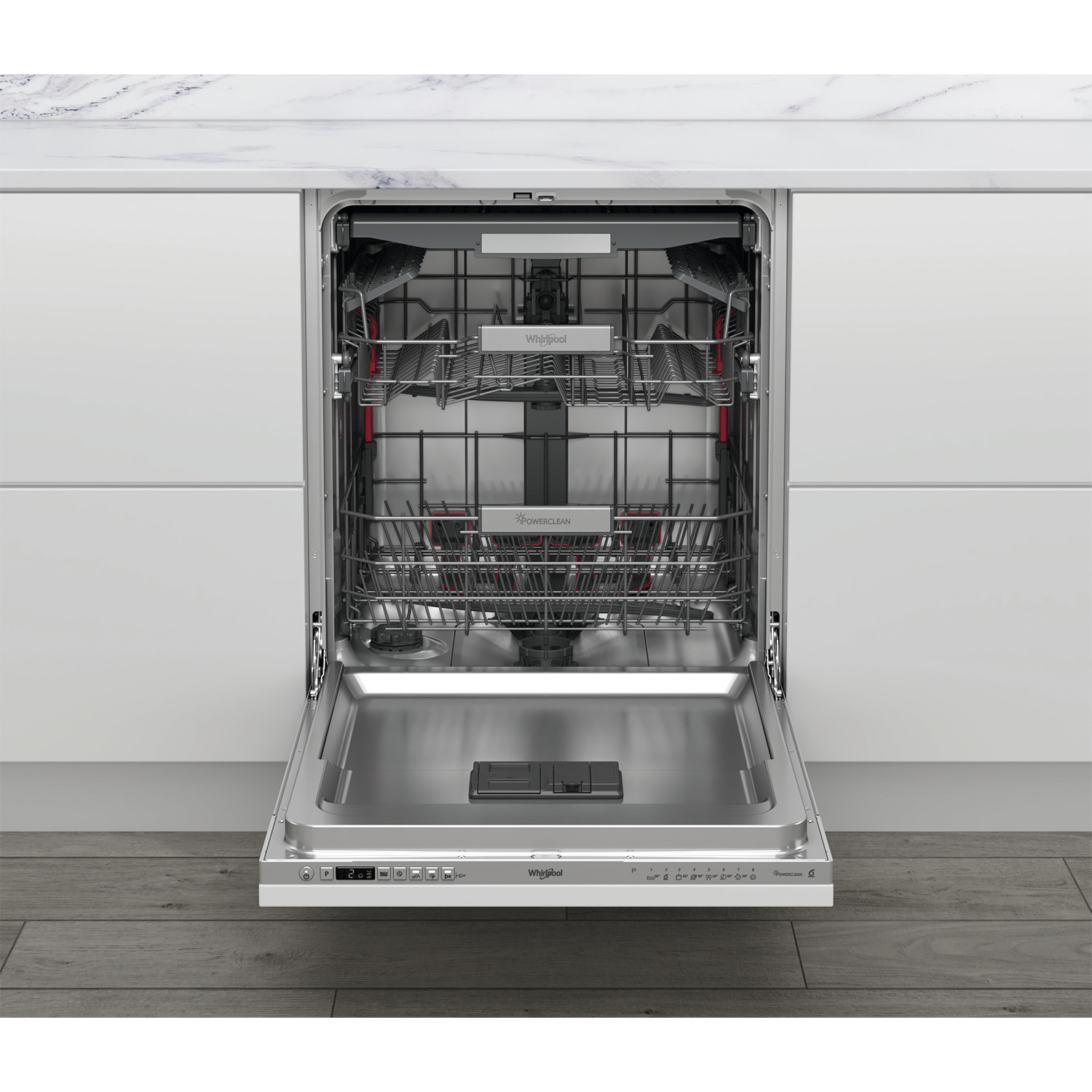Una lavastoviglie aperta, con ripiani e interno in acciaio inox, contro una cucina bianca.