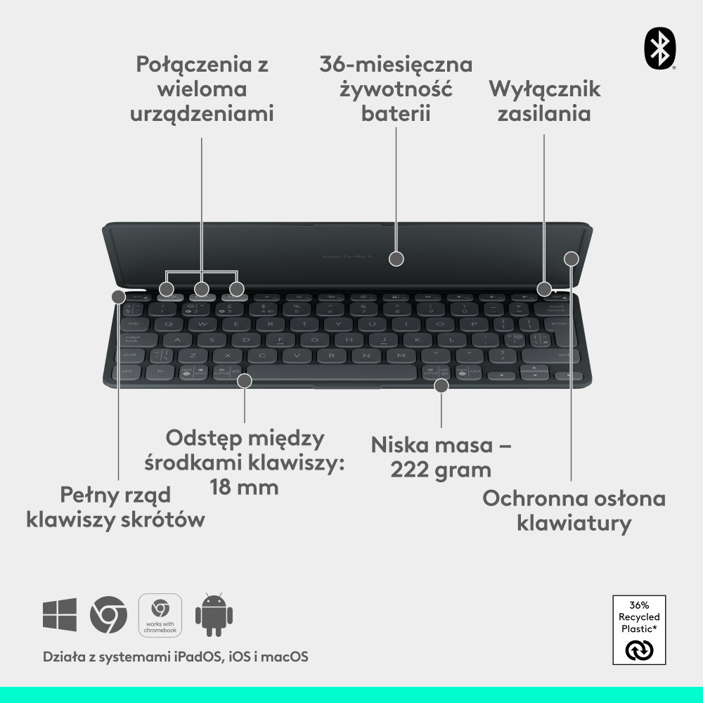Klawiatura na stole, z wieloma klawiszami i symbolami. Jest to klawiatura Logitech.