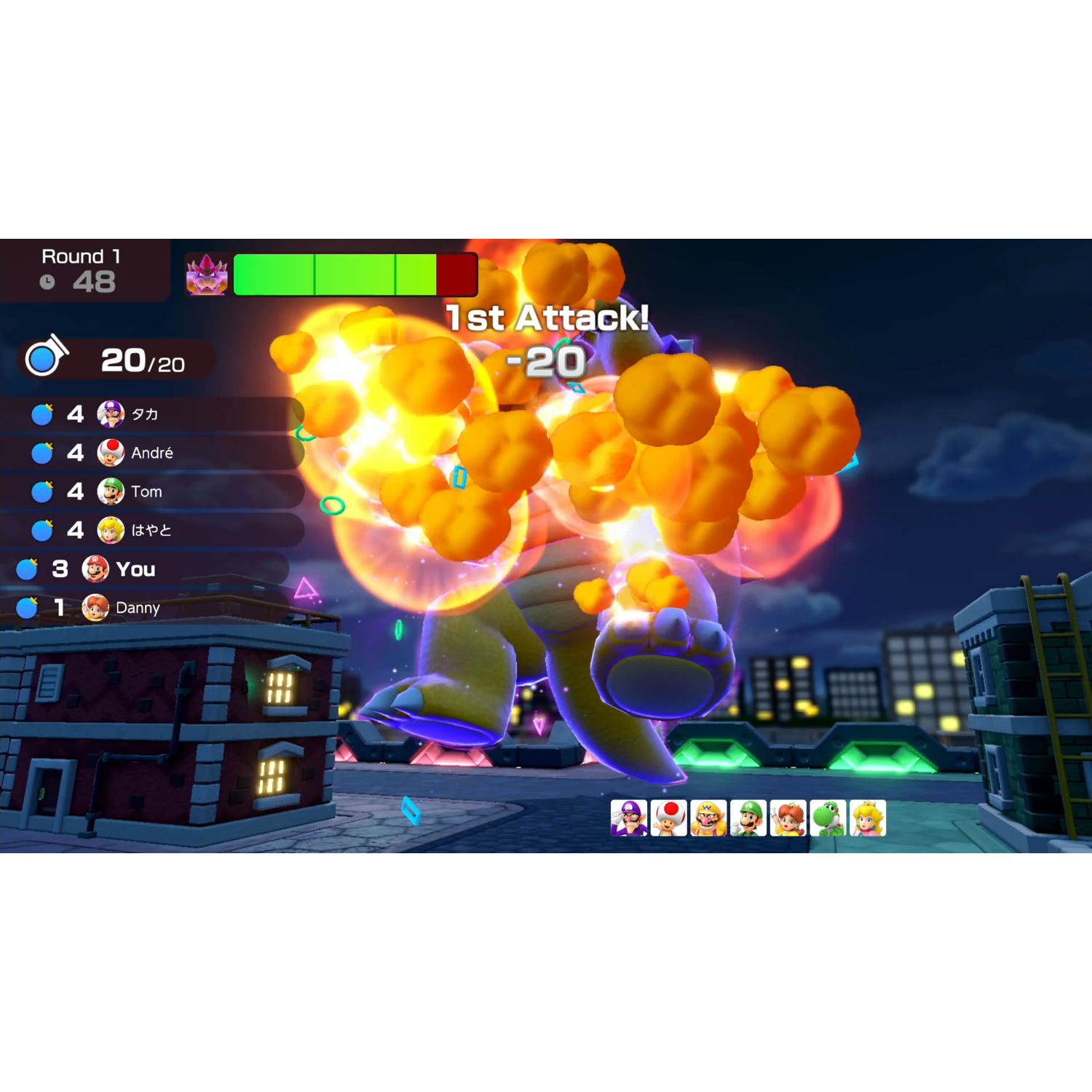 A video game screen showing a battle scene. Animated characters are fighting with explosions and health bars.
