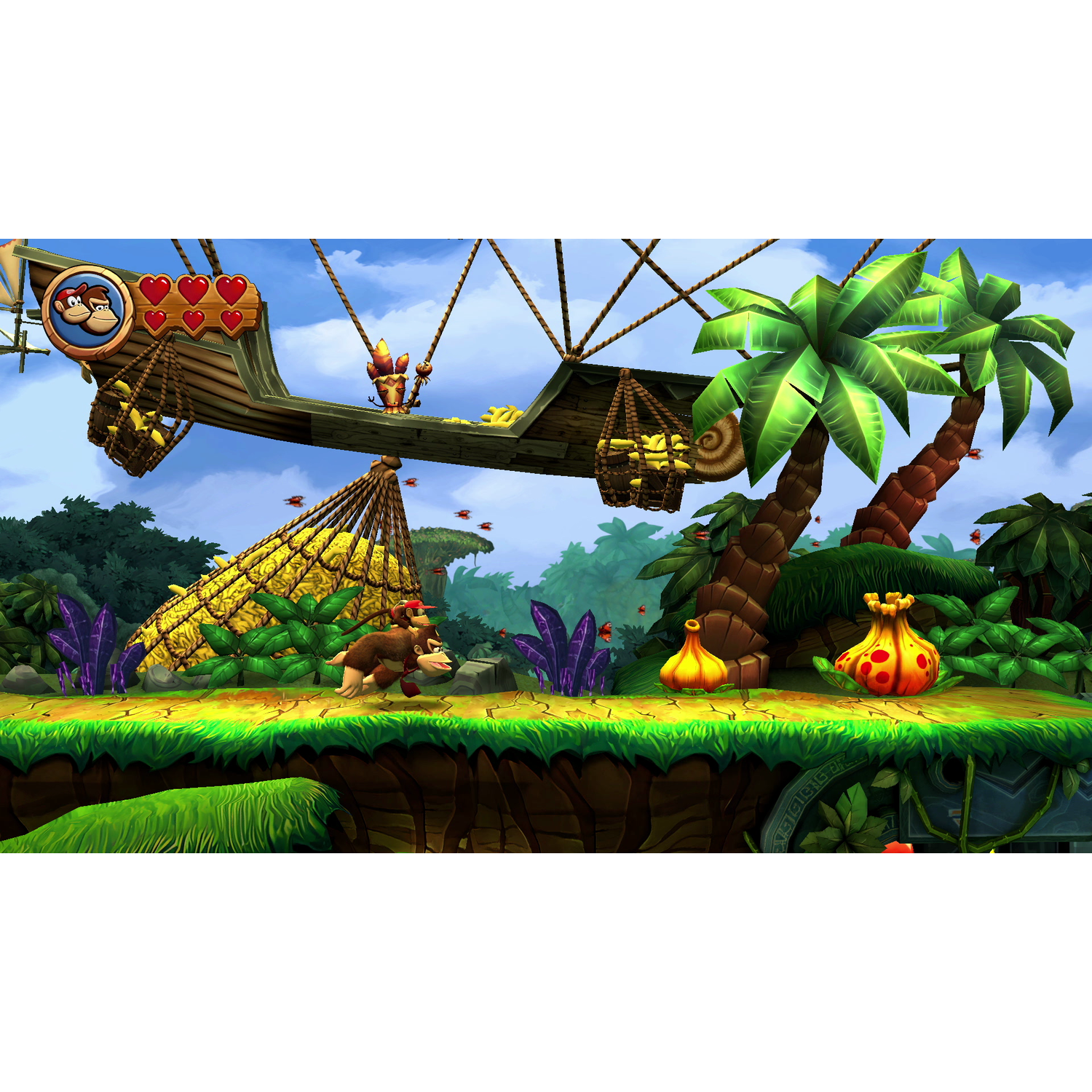 Donkey Kong-spelscène: DK, voor een kar, en een palmboom op een jungle-achtergrond.