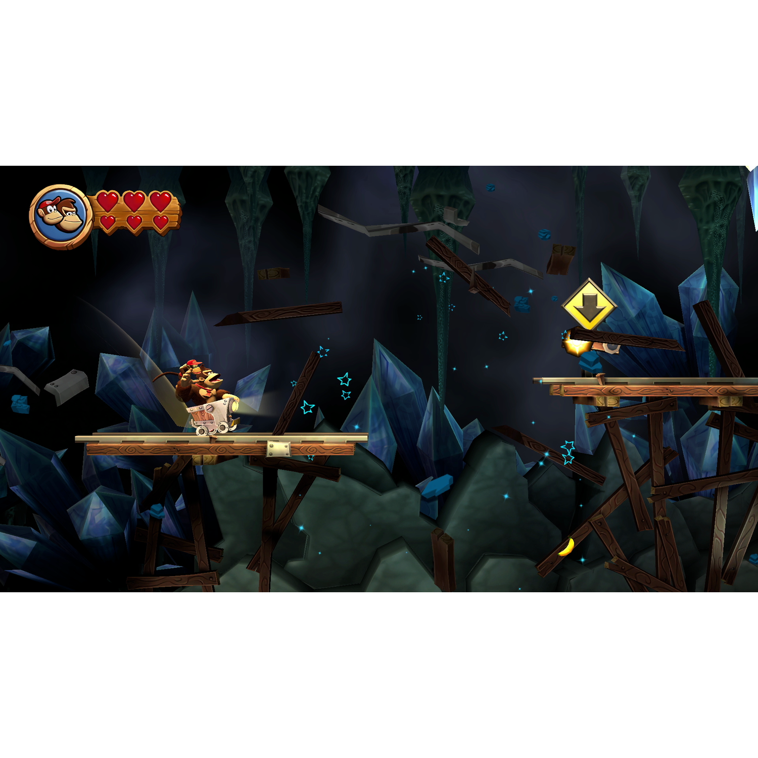 Een Donkey Kong scène met een kar op rails, kristallen en een geel bord.
