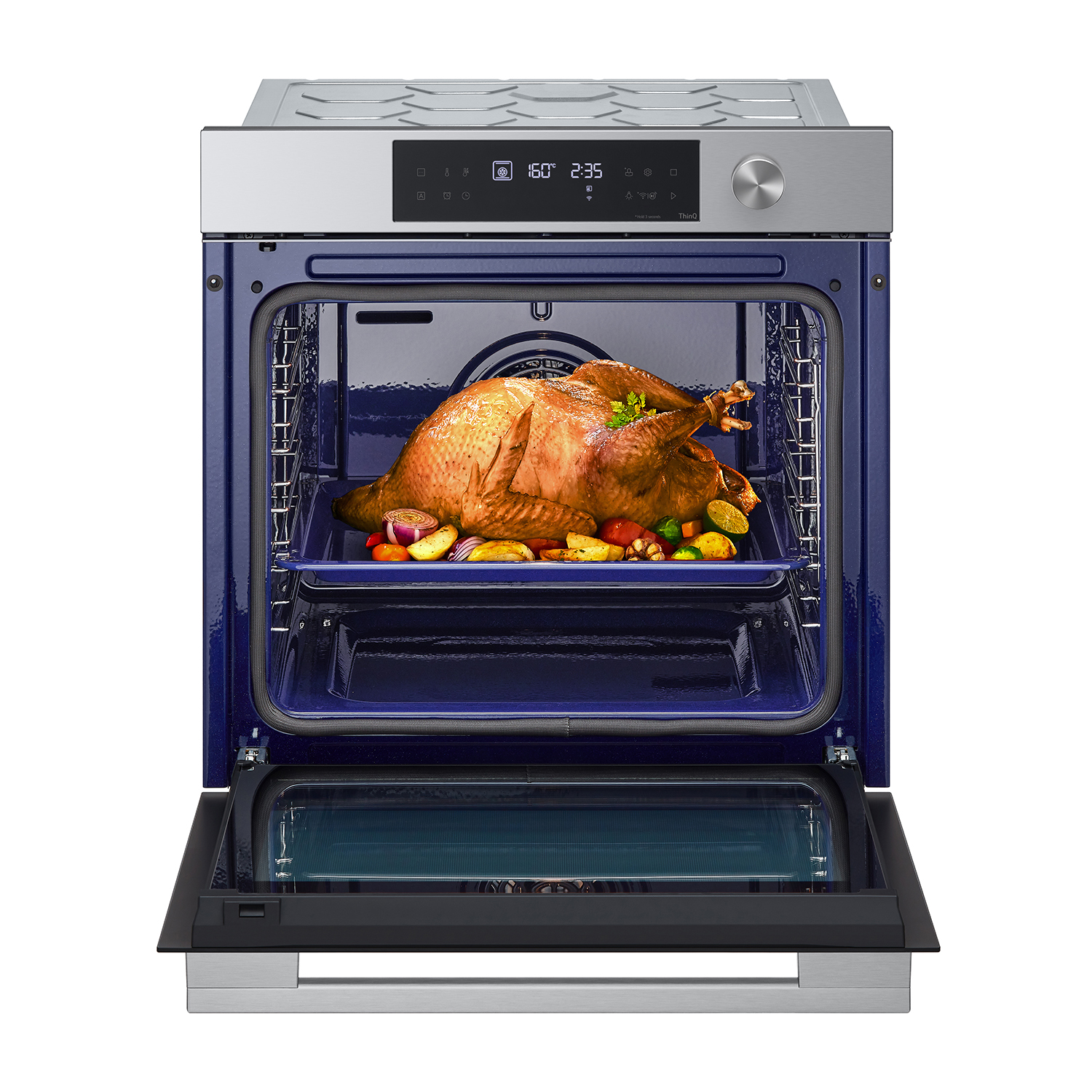 Forno con tacchino arrosto e verdure.