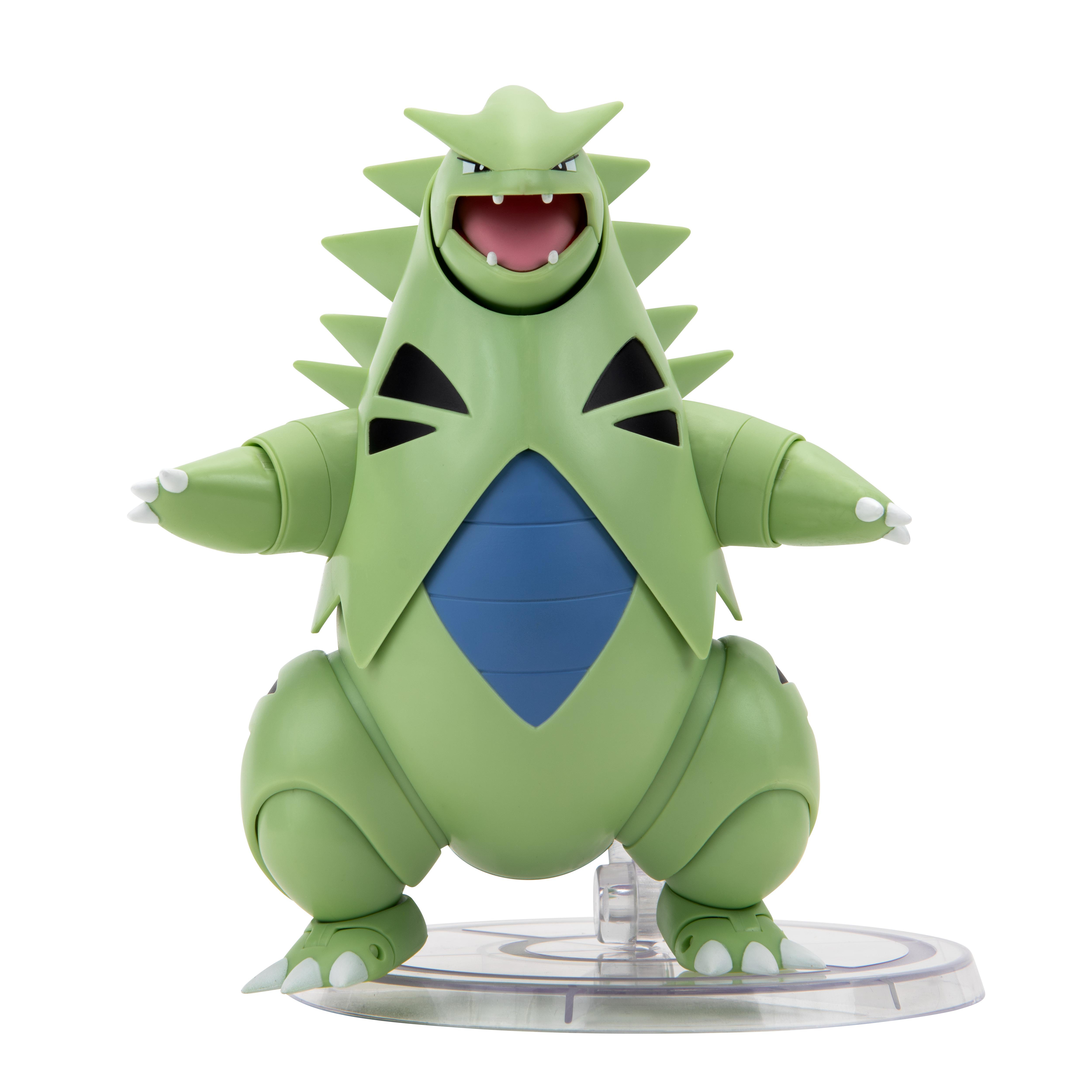 Grüne Tyrantrum-Figur. Sie befindet sich in einer dynamischen Pose mit offenem Mund auf einem transparenten Ständer.