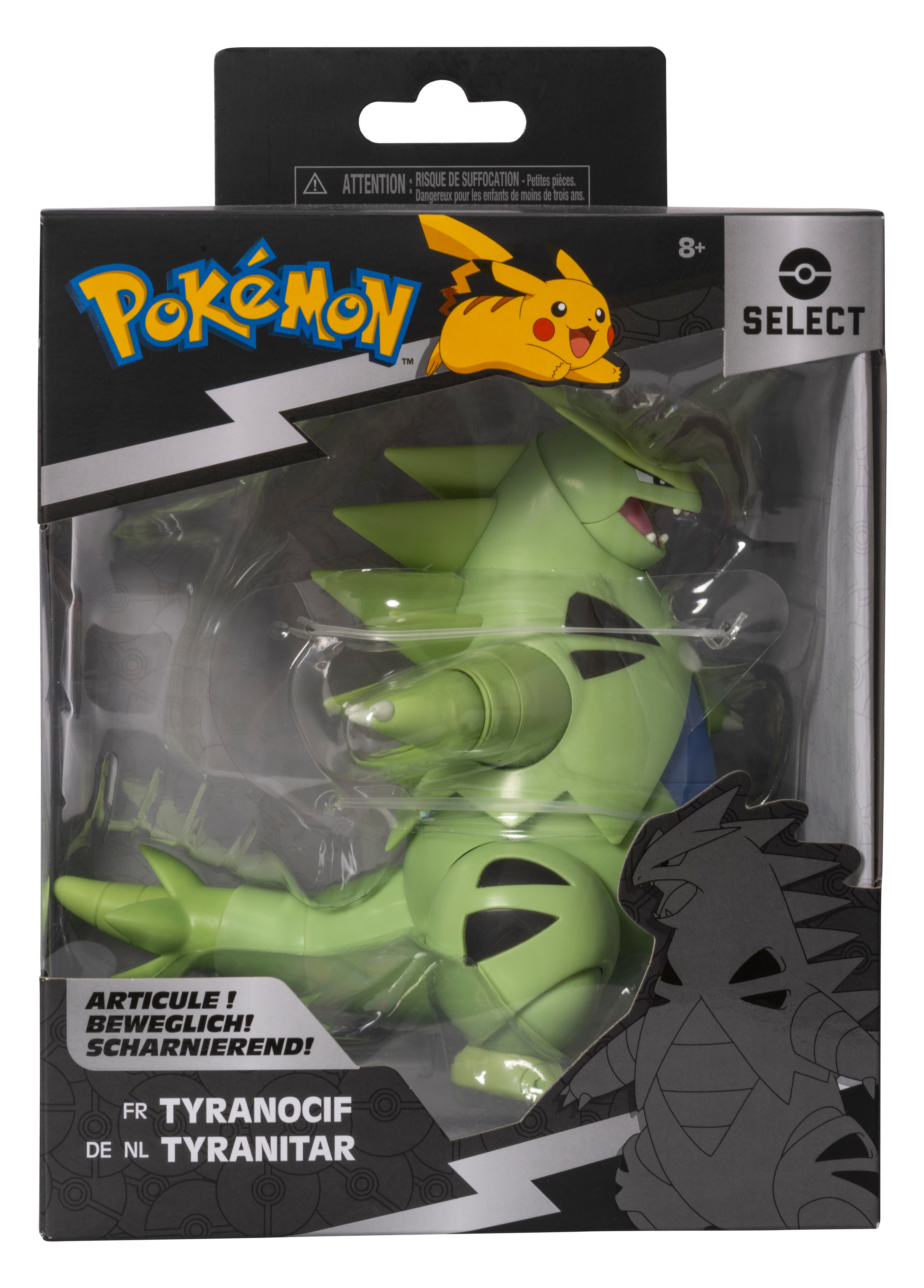 Pokémon-Tyranitar-Actionfigur in einer Box. Grüne Figur, schwarze und transparente Verpackung.