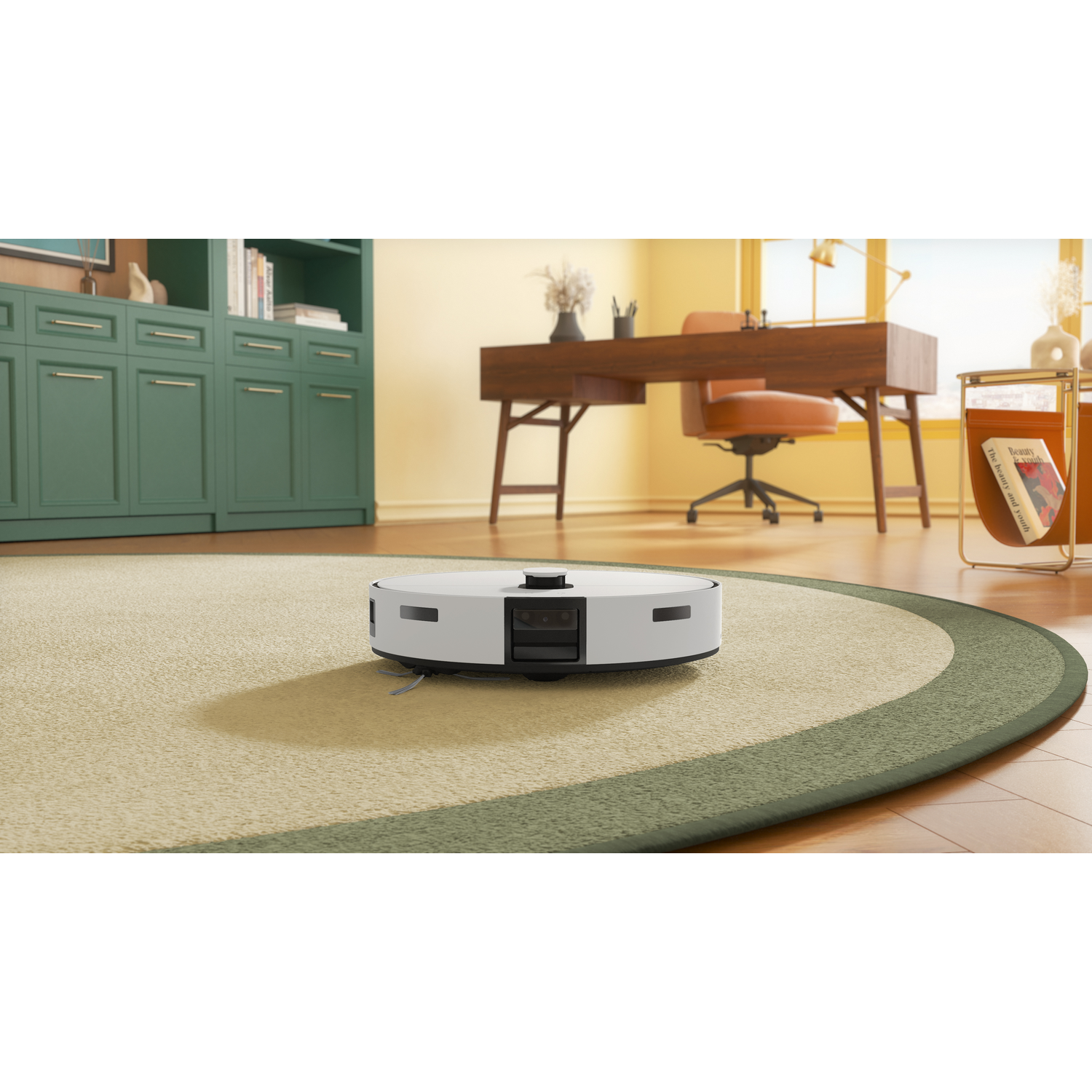 Robot vacuum cleaner on a carpet. Desk, chair, and background decor are visible.