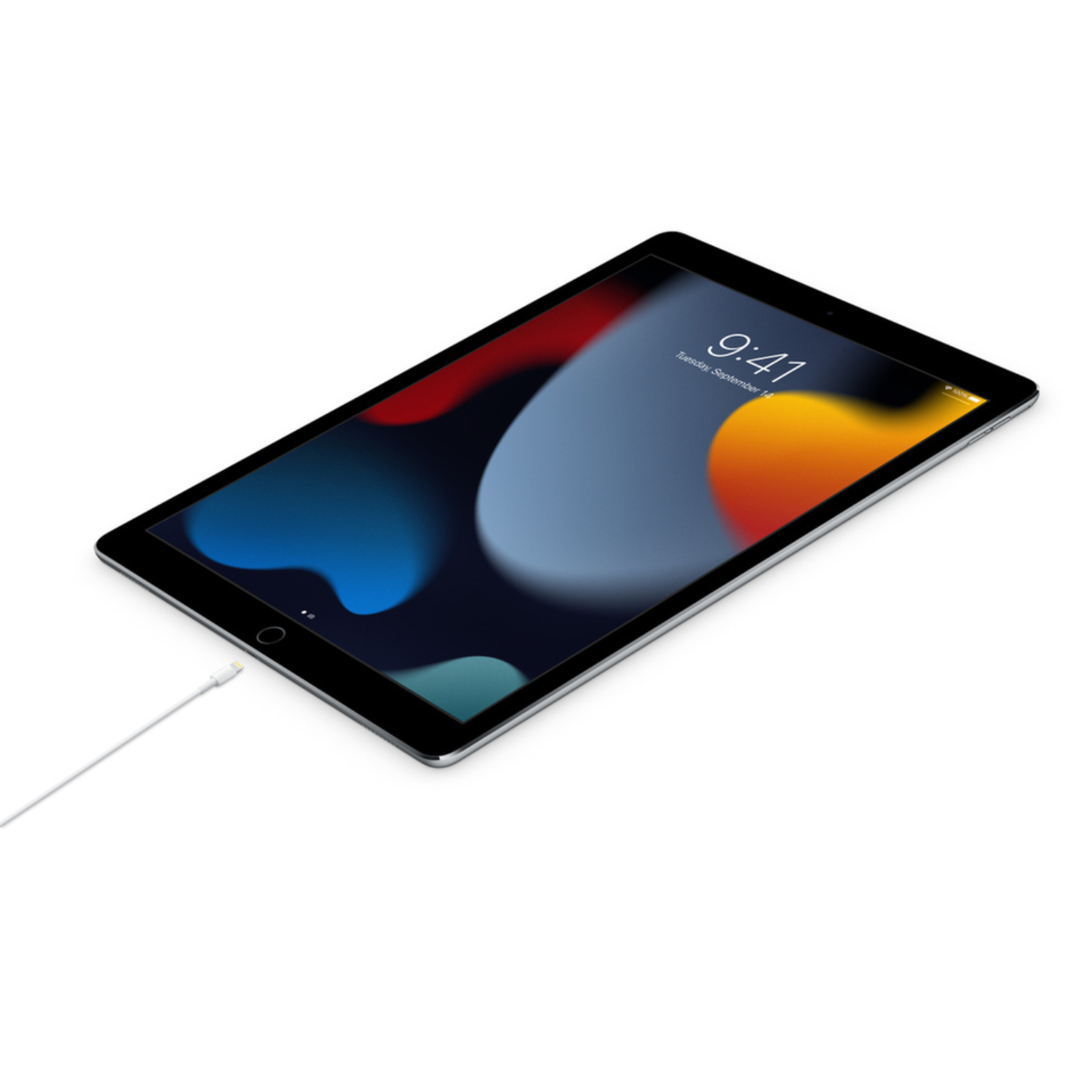 Tablet with a charging cable, showing a colorful wallpaper.