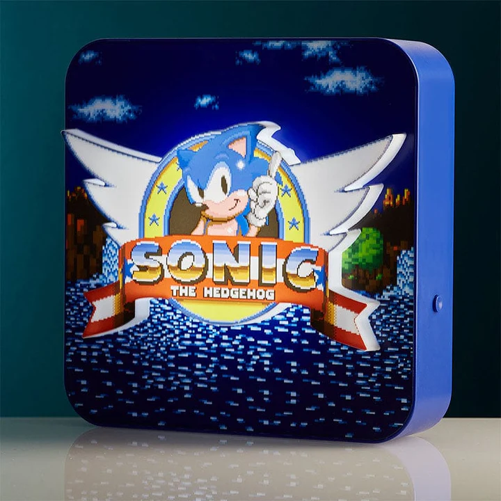 Sonic the Hedgehog Leuchtschild. Blauer Rahmen, Sonic in der Mitte, pixeliger Hintergrund.
