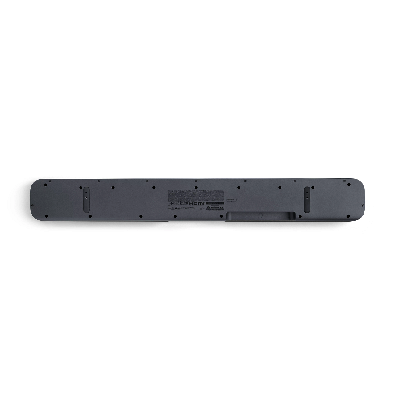 La parte inferior de una barra de sonido gris oscuro sobre un fondo blanco. Tiene varios orificios y etiquetas.