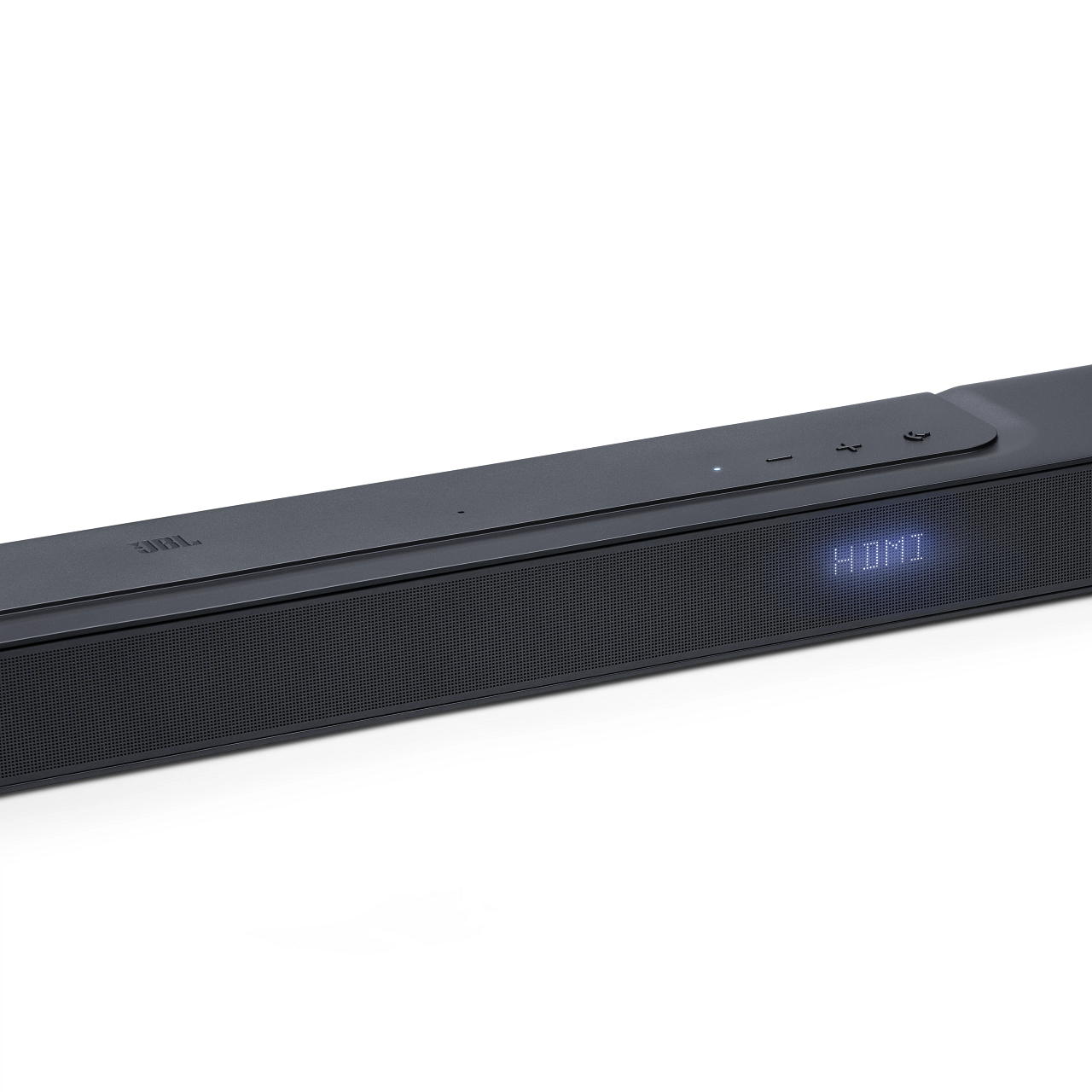 Barra de sonido JBL negra sobre fondo blanco. Etiqueta HDMI y botones de control arriba.