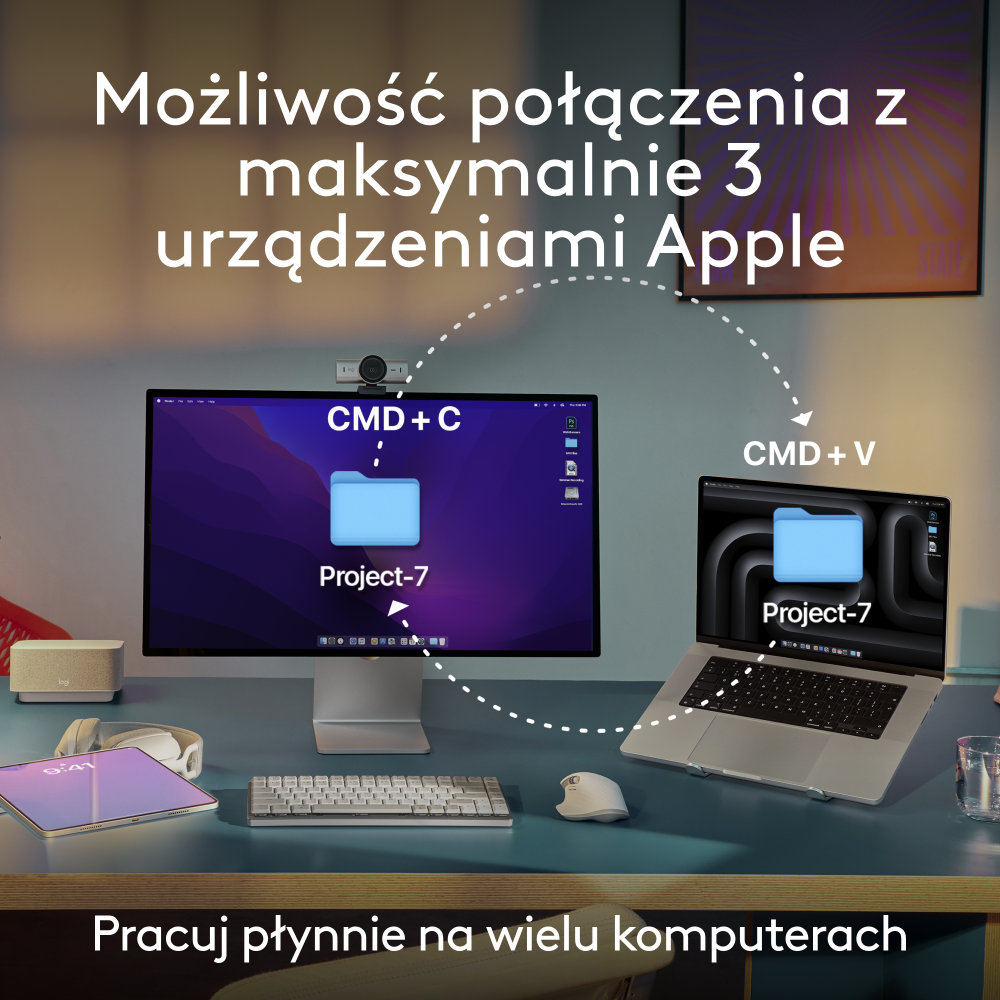 Monitor i laptop podłączone, tablet, słuchawki i mysz na biurku.