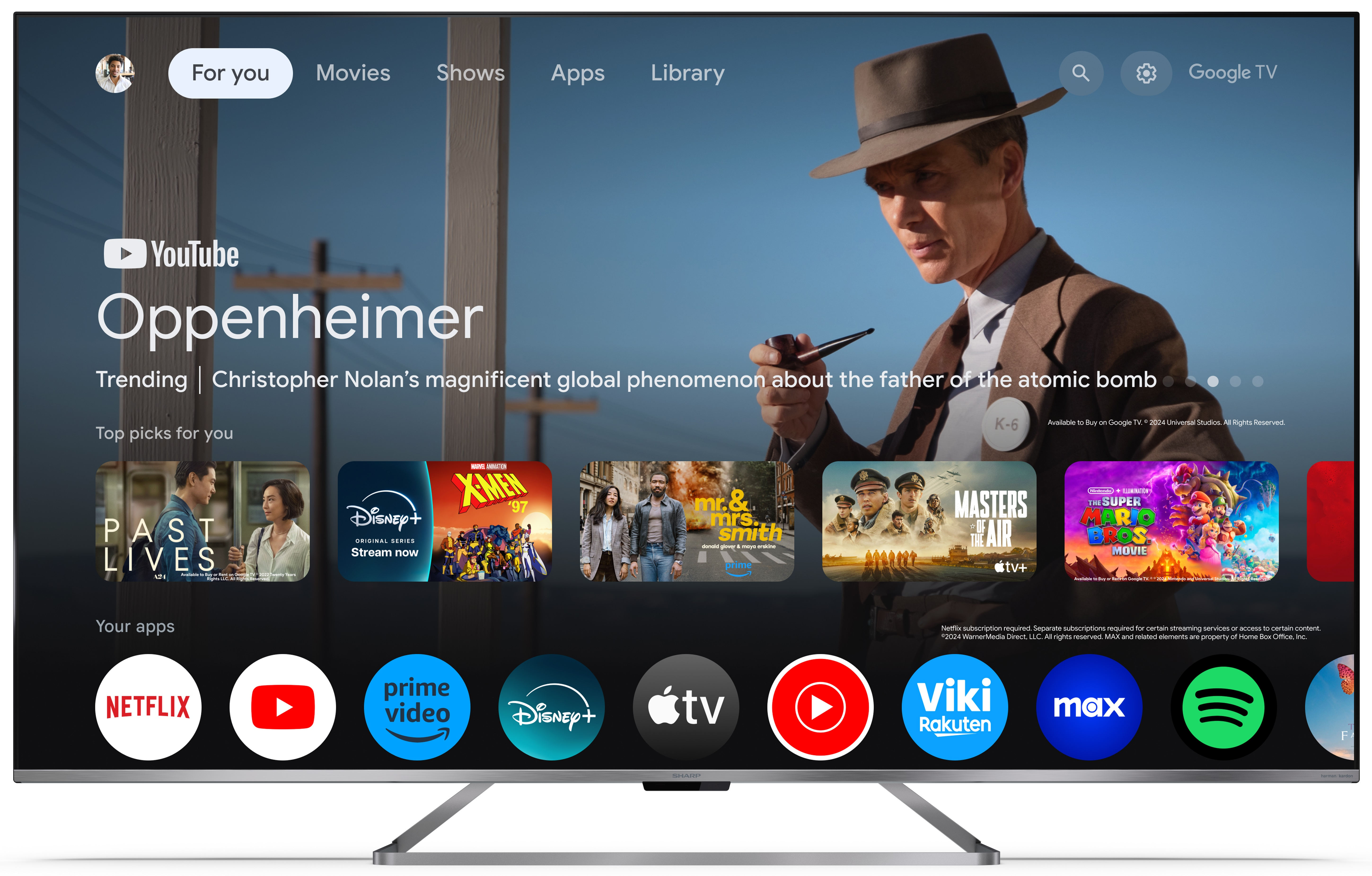 Duży telewizor wyświetlający interfejs filmowy z opcjami filmowymi.