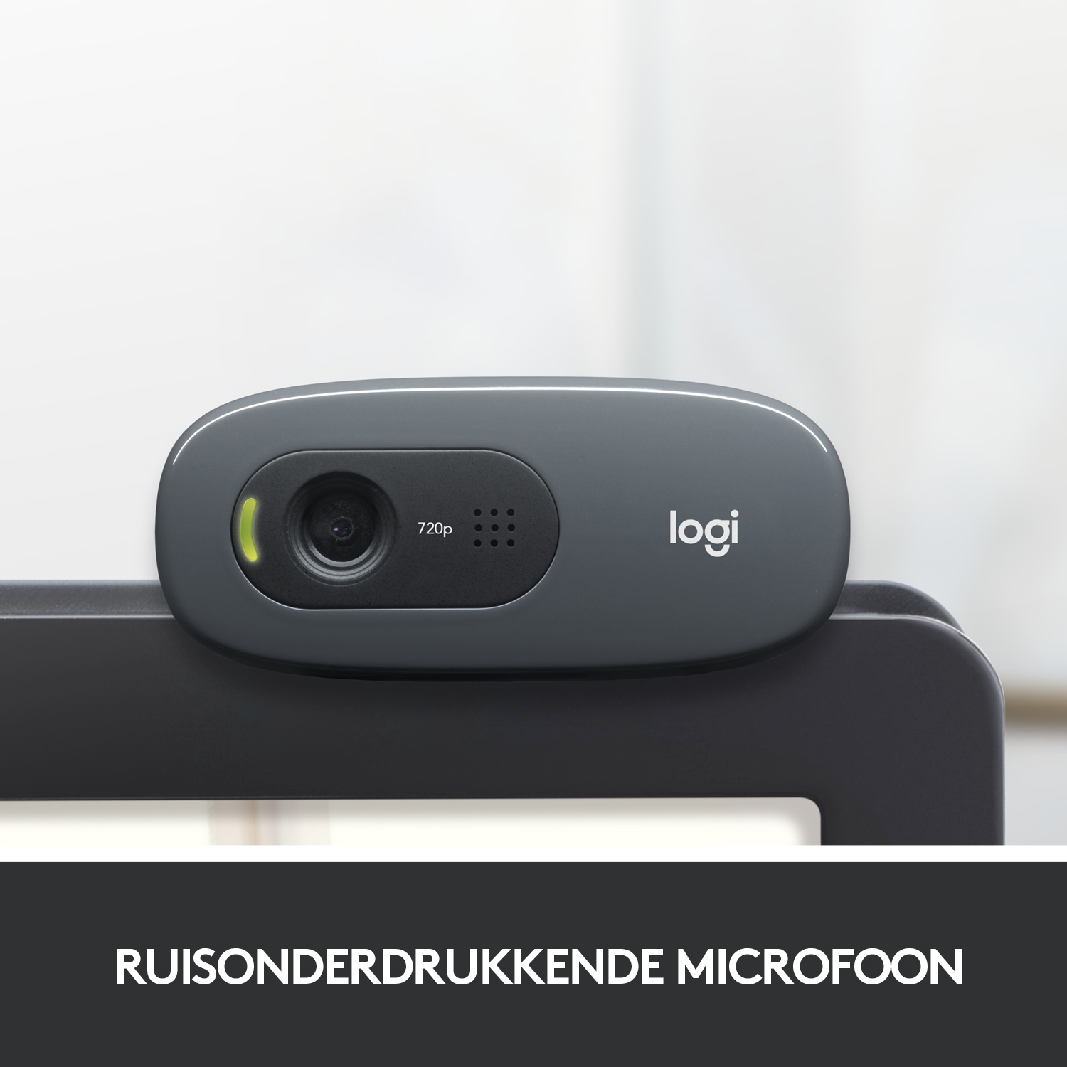 A grey webcam mounted on a monitor, with the Logitech logo and the text 720p on the camera.
