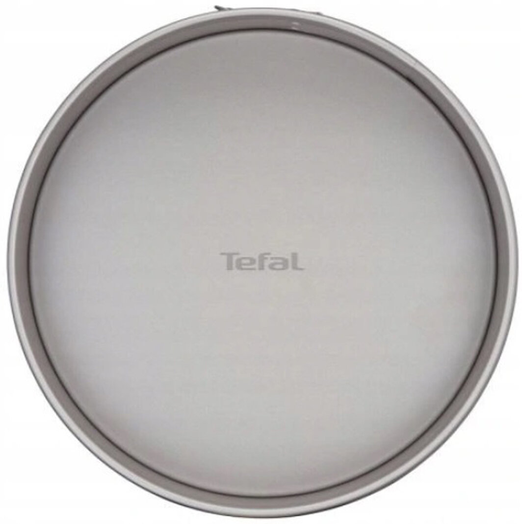 Owalna forma do pieczenia z logo Tefal pośrodku. Białe tło.