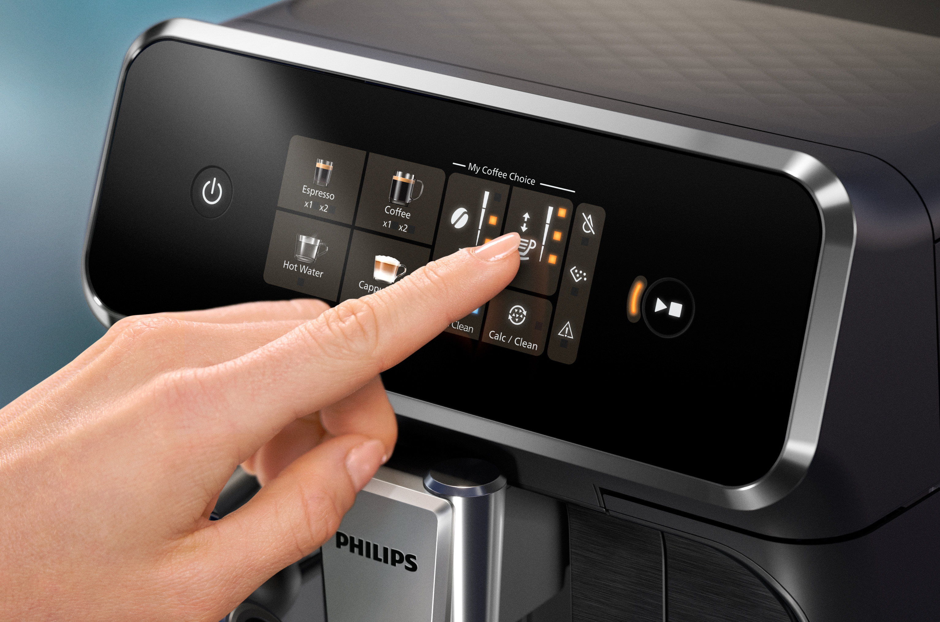 Mano tocando la pantalla de la cafetera. Opciones: espresso, café, capuchino, agua caliente, limpiar, calc.