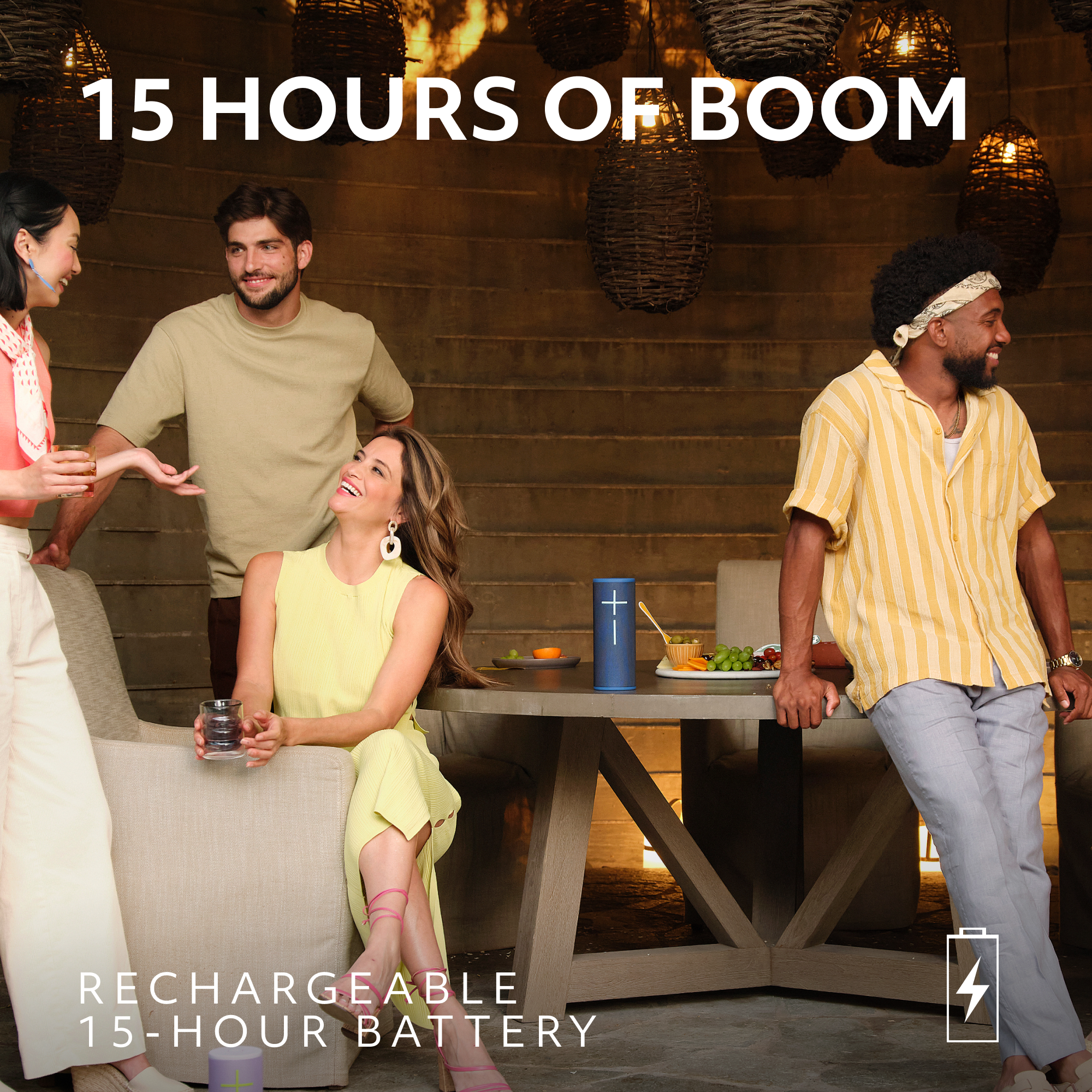 Quatre personnes socialisant avec un haut-parleur bleu et le texte '15 HOURS OF BOOM'.