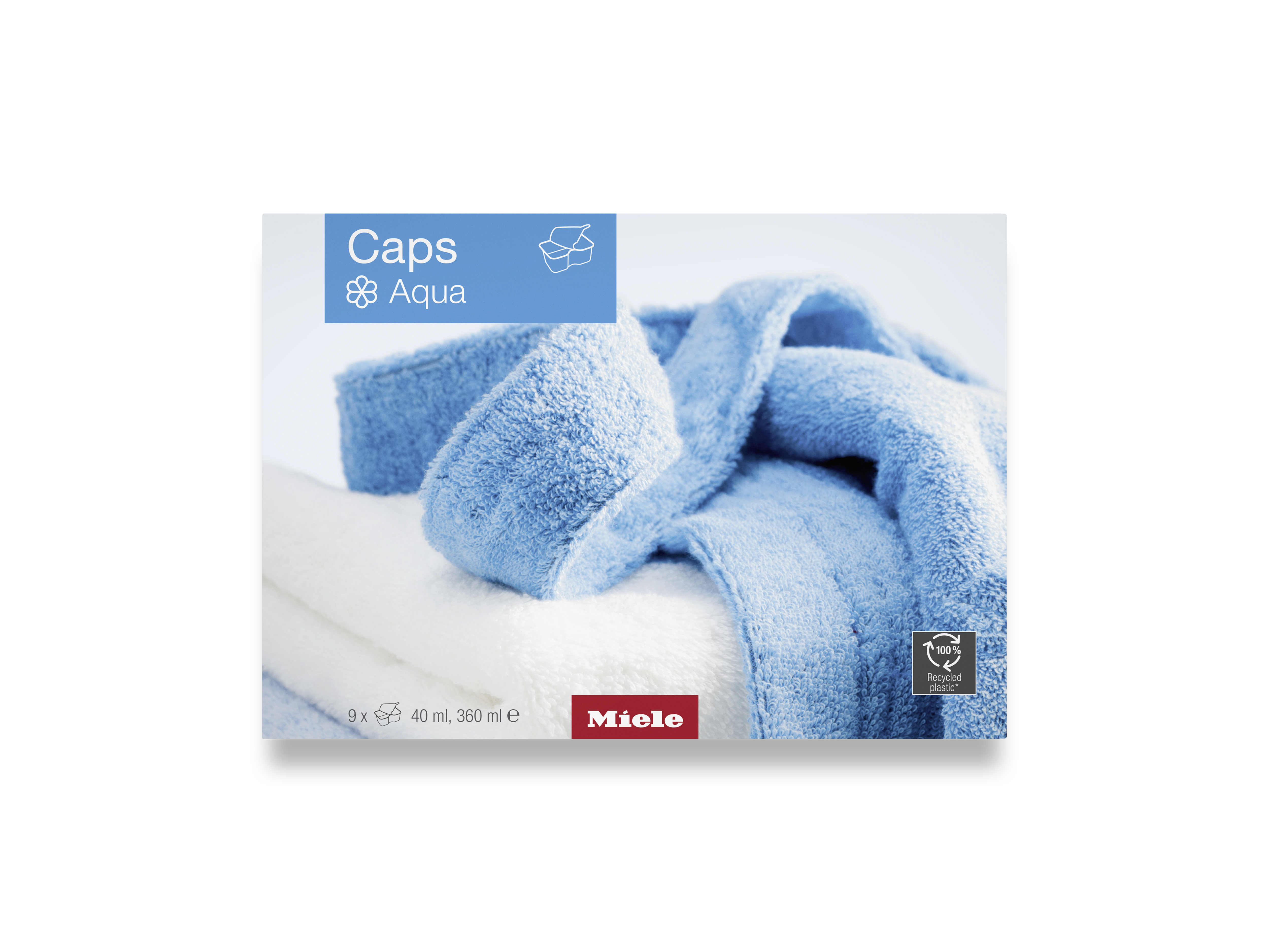 Eine Packung Miele Aqua Waschmittelkapseln mit blauen Handtüchern.