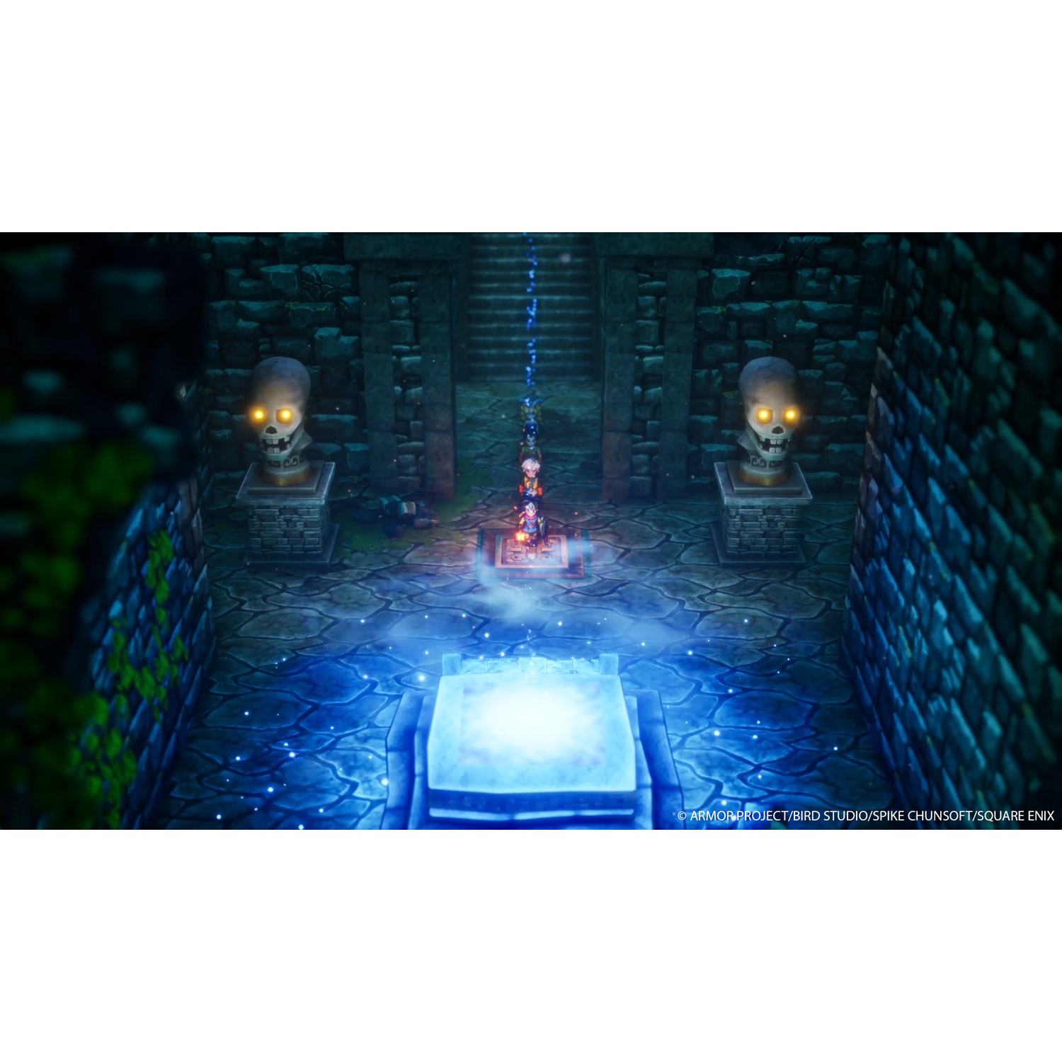 A scene from a video game. Two skull statues flank a corridor with a glowing altar.