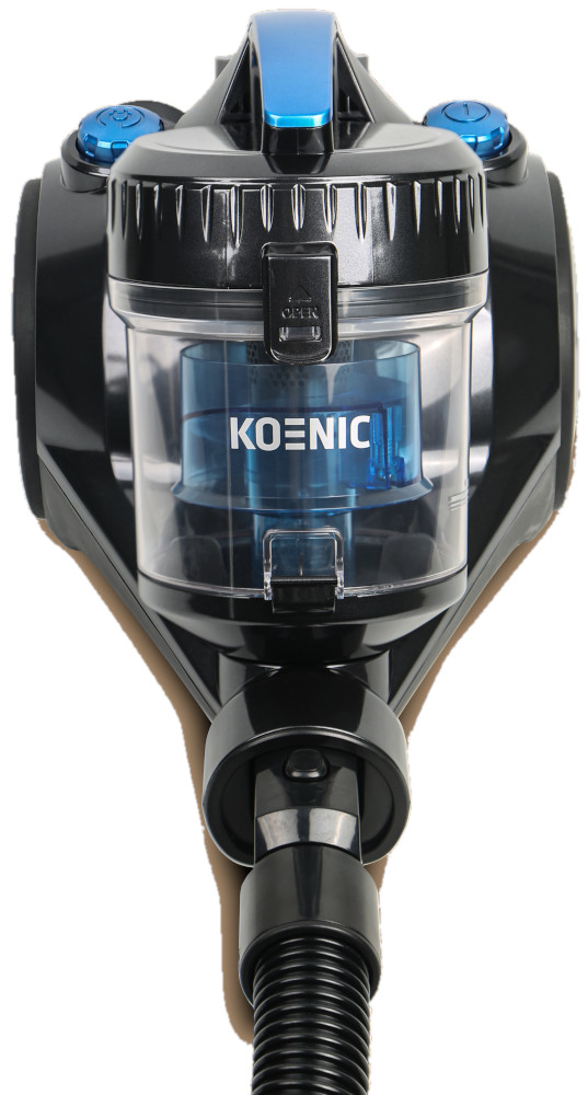 Black vacuum cleaner. Clear dust bin showing blue filter.  Blue buttons on top.