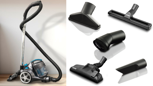 Vacuum cleaner with attachments. White background.