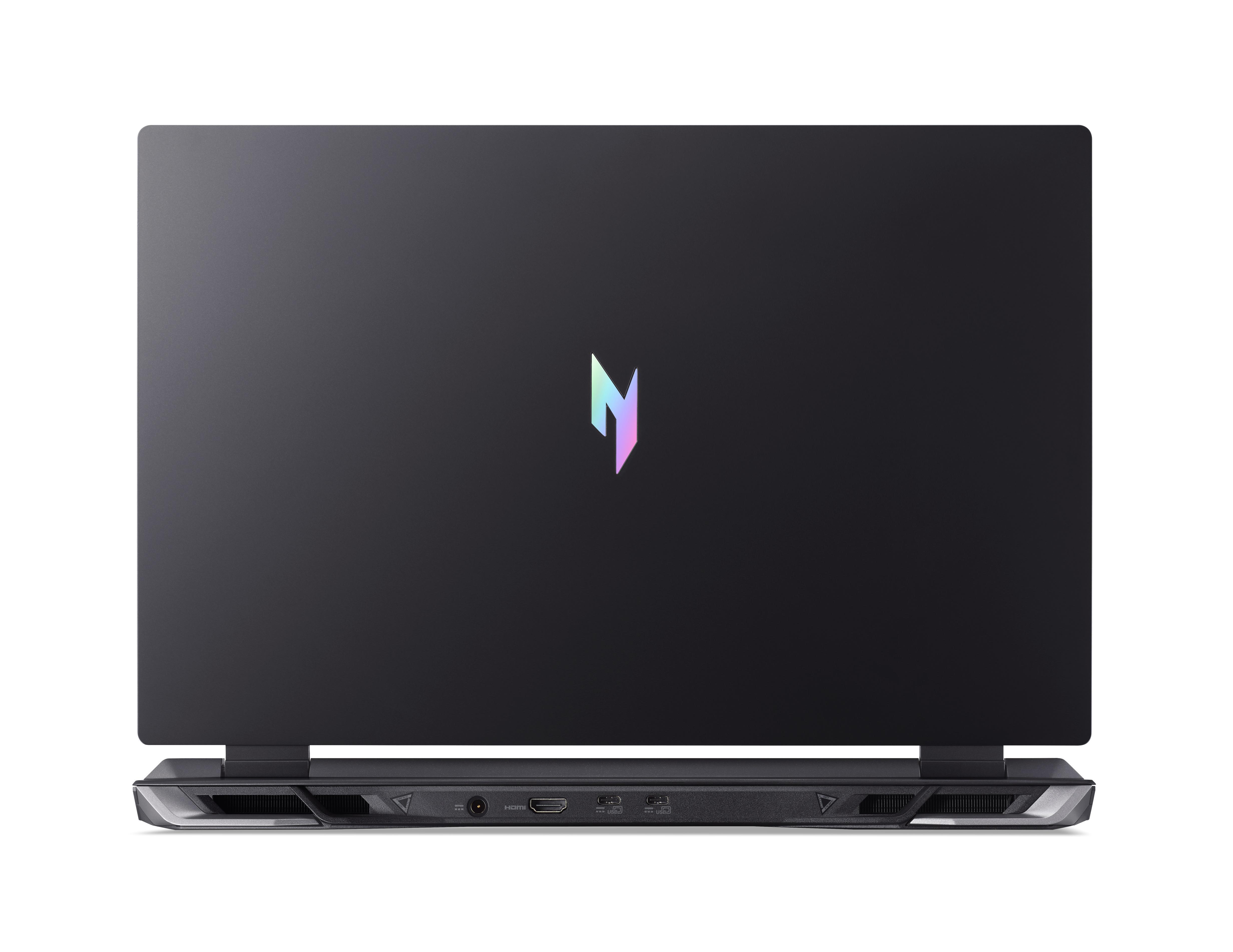 Laptop mit beleuchtetem Bildschirm, der ein Logo zeigt.
