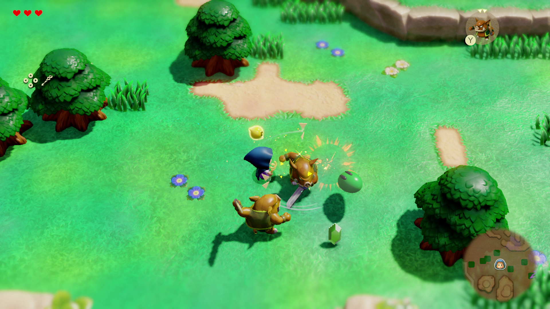 Una scena di videogioco: Link combatte i nemici in un campo verde. Ci sono alberi, fiori e cuori.