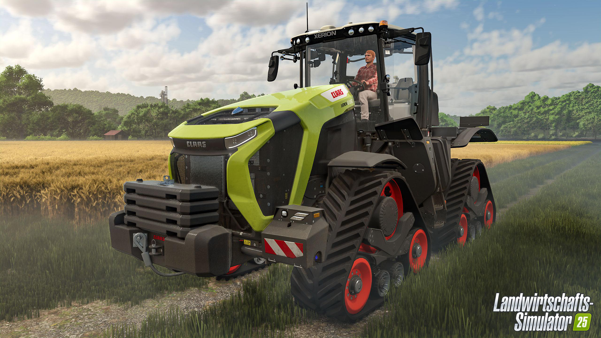 Ein grüner und schwarzer Claas Xerion-Traktor mit einem Fahrer in der Kabine steht auf einem Feld.