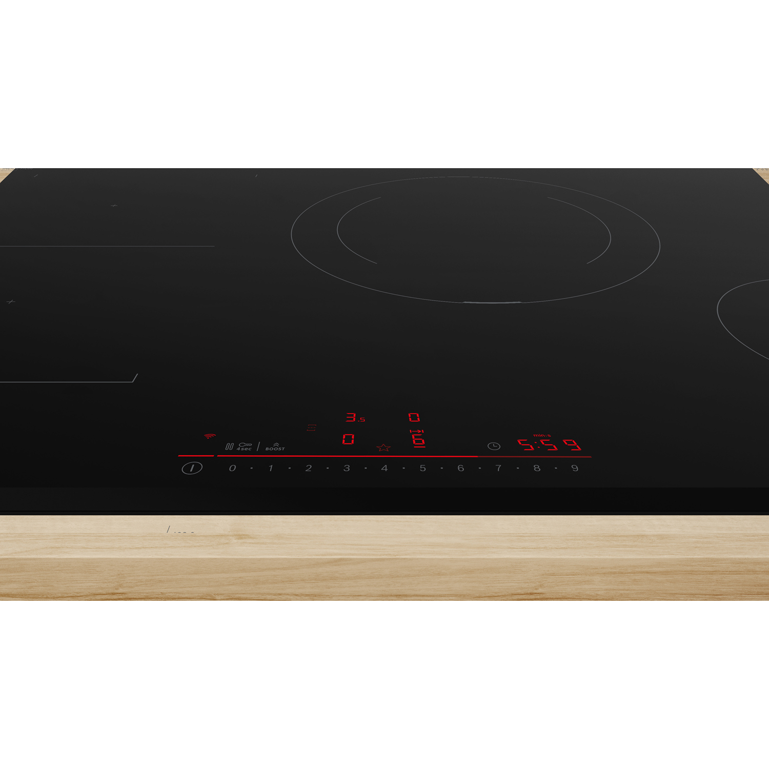 Piano cottura nero con comandi e luci rosse, su un tavolo di legno.