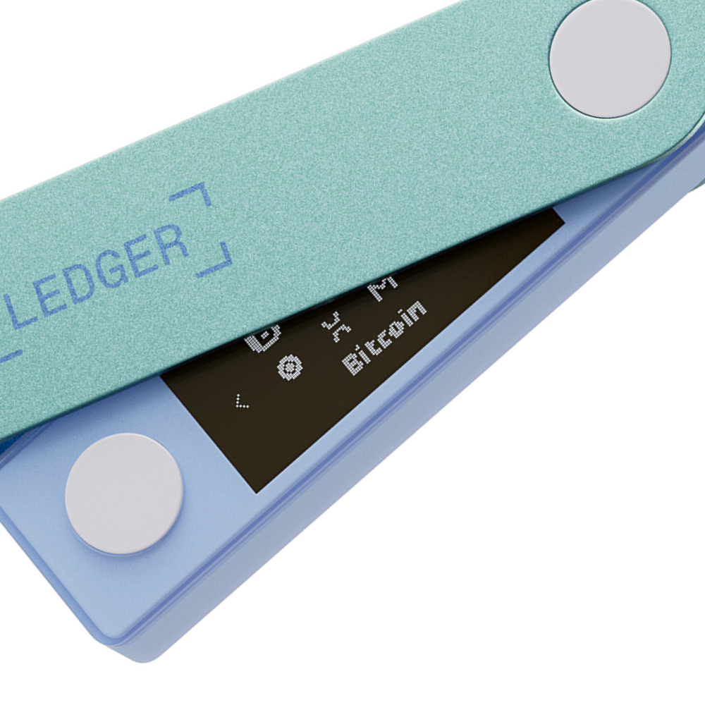 Mavi bir taban üzerinde nane yeşili bir Ledger donanım cüzdanının yakın çekimi.