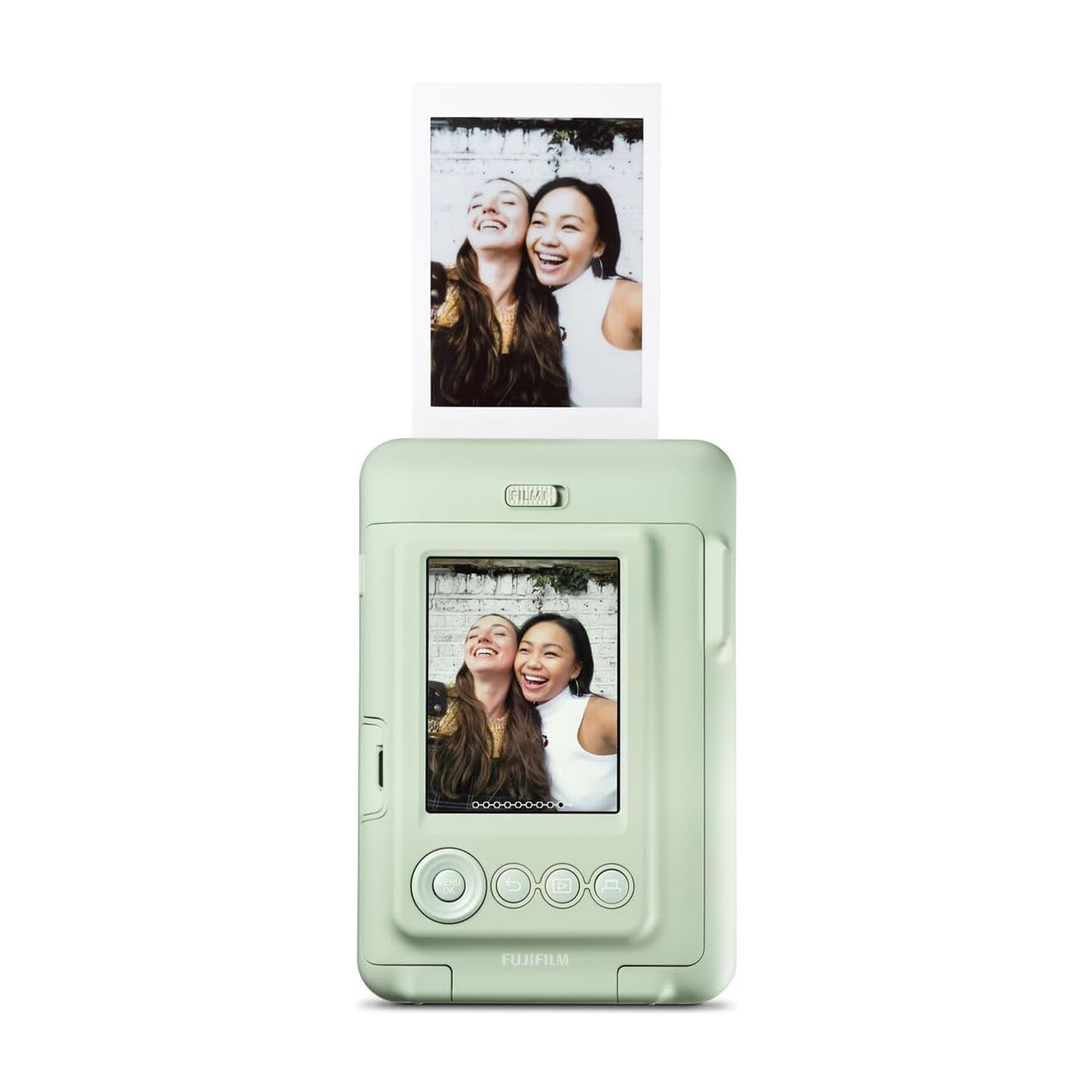 Fotocamera istantanea verde e una foto con due donne sorridenti.