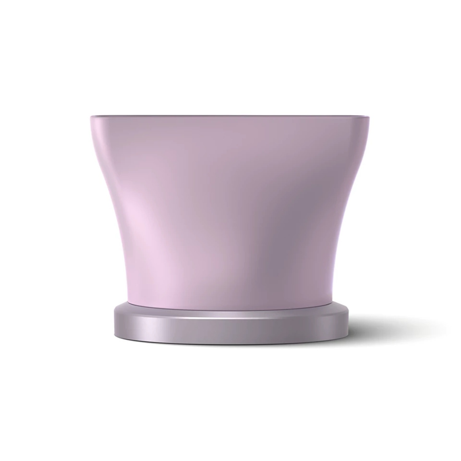 A light pink hair dryer on a silver base.