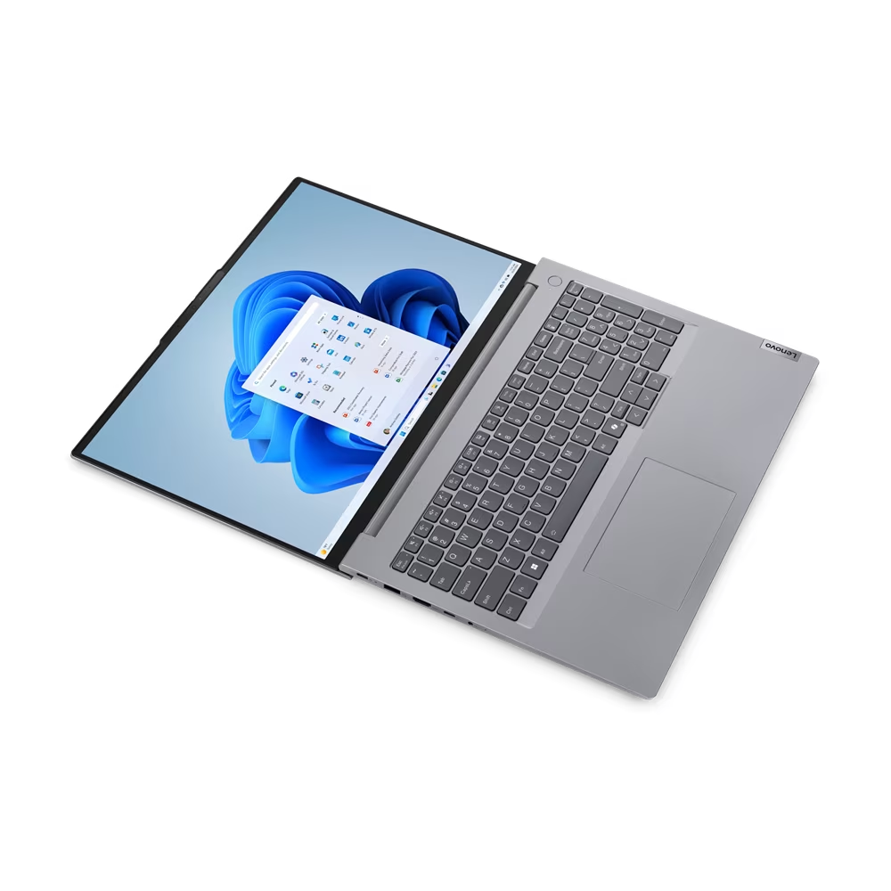 Una computadora portátil con el escritorio de Windows abierto en ambas pantallas.