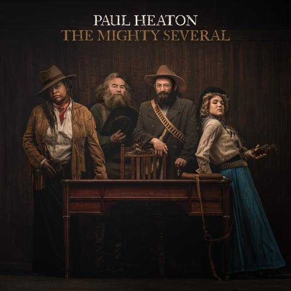 Ein Albumcover mit vier Personen mit Hüten, die neben einem Tisch posieren.