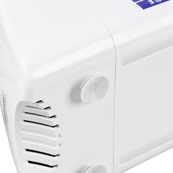 Zbliżenie białej maszyny z dwiema przyssawkami. Białe tło.