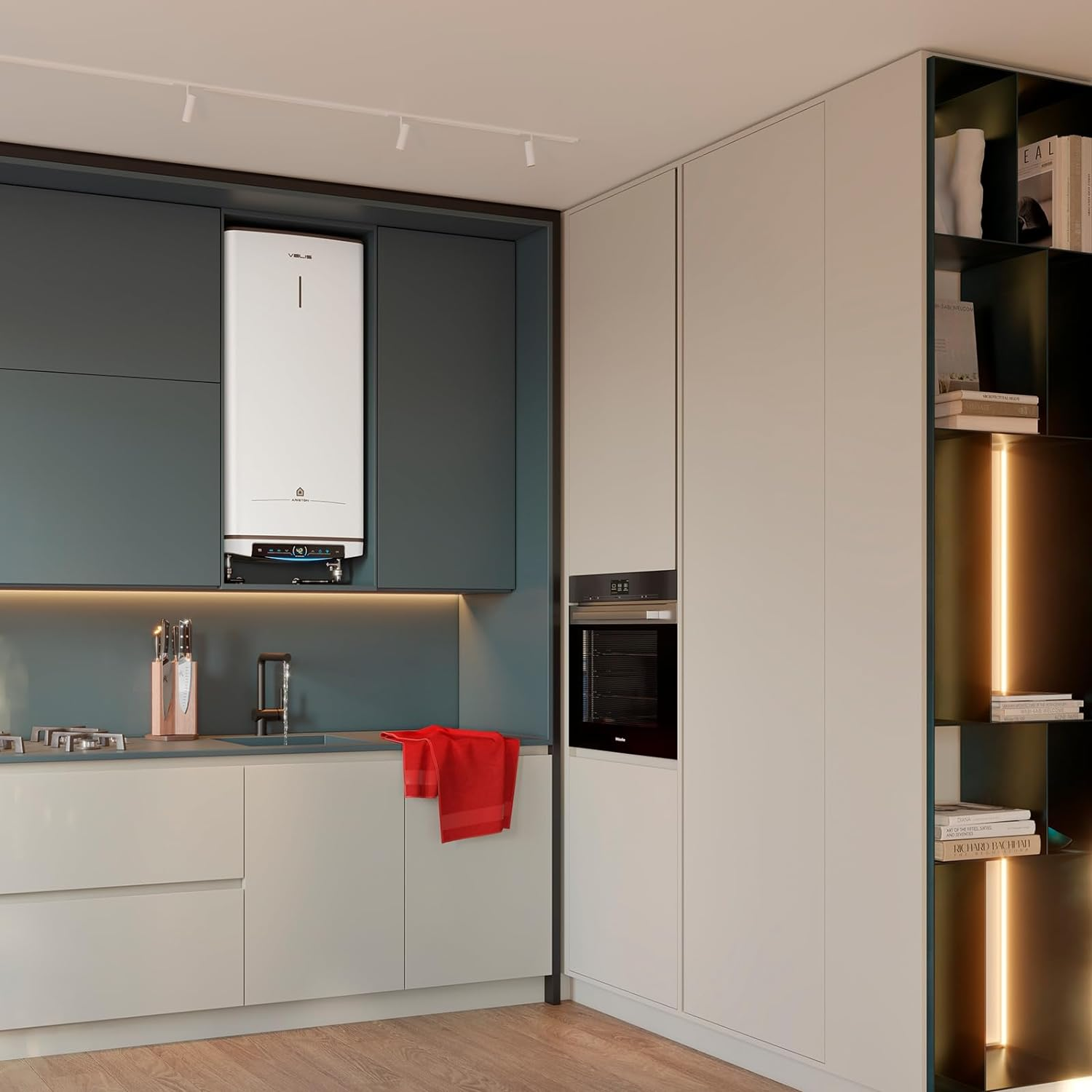 Cocina moderna con gabinetes blancos, pared azul y electrodoméstico blanco. Cuelga una toalla roja.