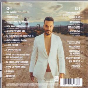 Albumcover mit Mann im weißen Anzug. CD 1 und CD 2 Tracklisten werden angezeigt.