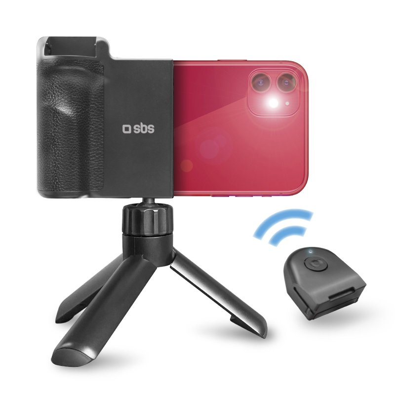 Rotes Telefon in schwarzem Telefonhalter auf Stativ. Drahtlose Fernbedienung. Weißer Hintergrund.