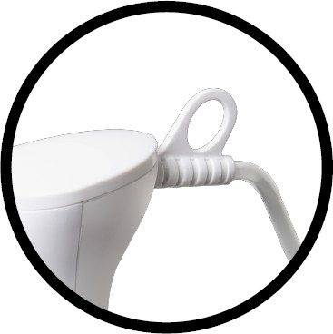 A close-up of a white handle of a kitchen appliance. A black circle frames the object.