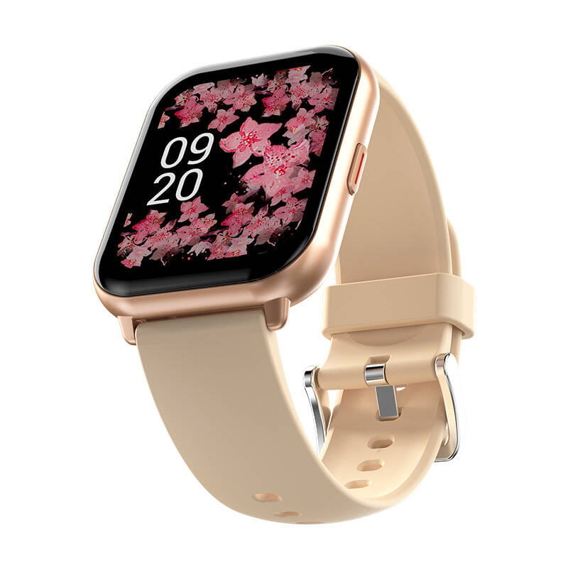 Smartwatch ze złotą kopertą i beżowym paskiem. Ekran wyświetla kwiatowy wzór.
