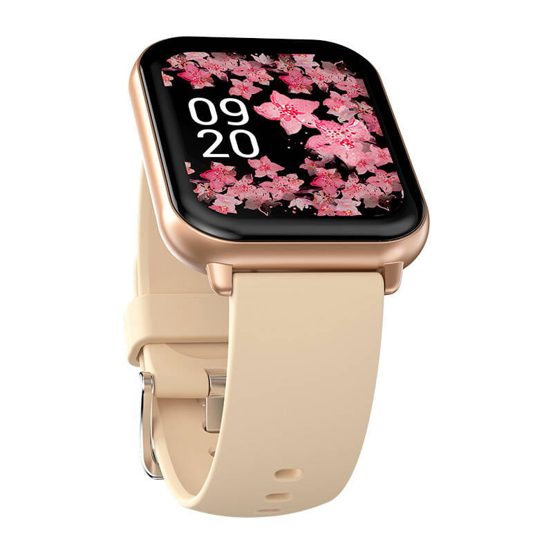 Smartwatch z beżowym paskiem. Ekran wyświetla kwiatowy wzór i godzinę.